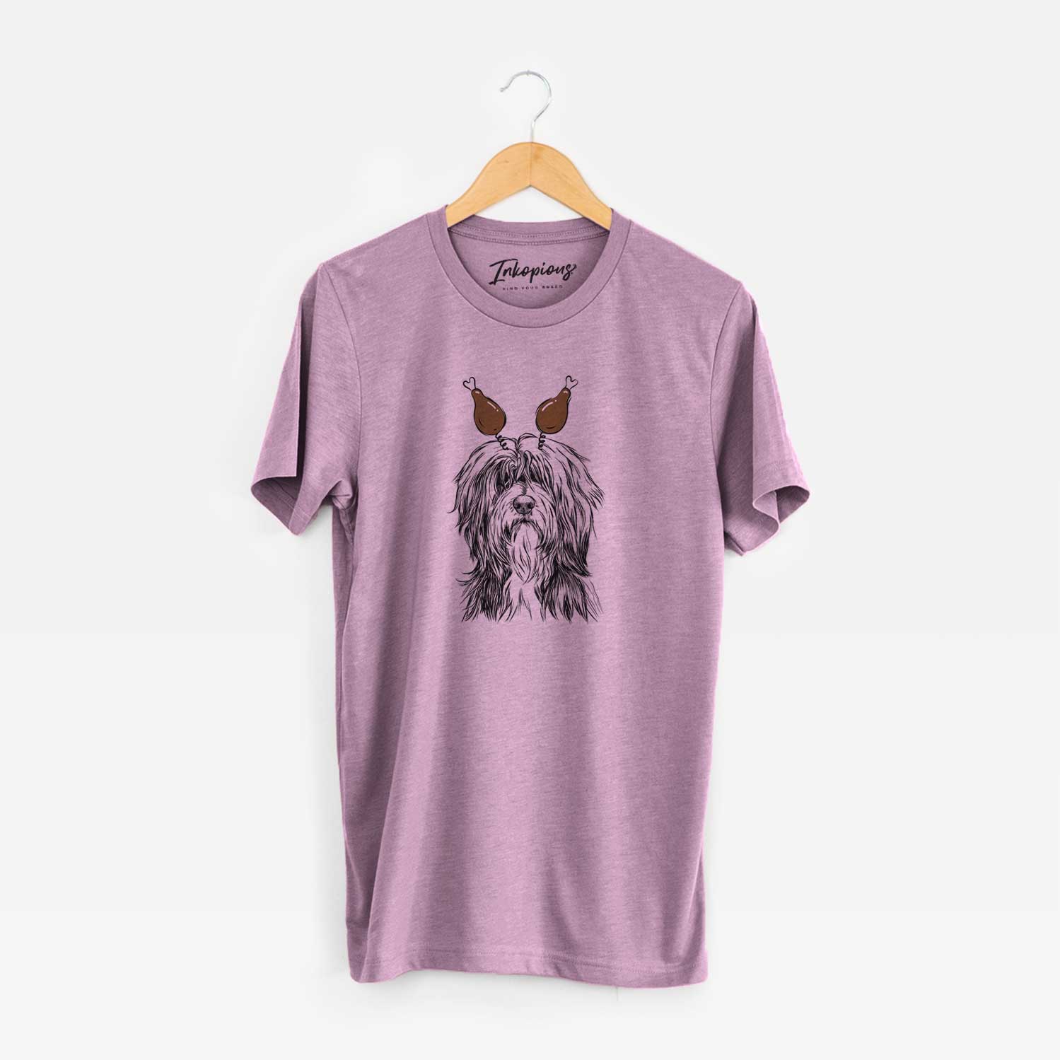 Hand-drawn sketch of Fiji the Polish Lowland Sheepdog with a Thanksgiving turkey headpiece on an Orchid Unisex crewneck