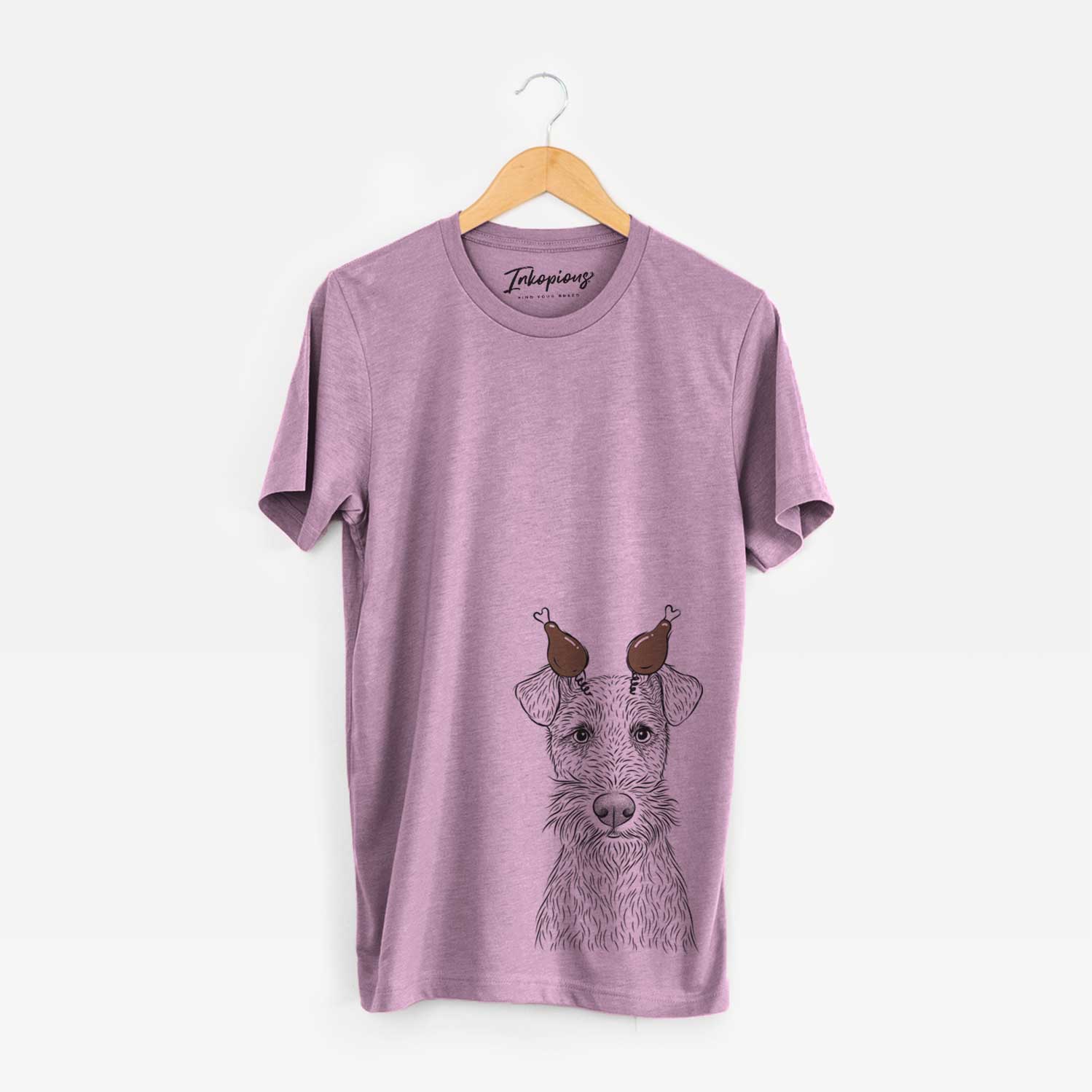 Hand-drawn sketch of Fitz the Wire Fox Terrier with a Thanksgiving turkey headpiece on an Orchid Unisex crewneck