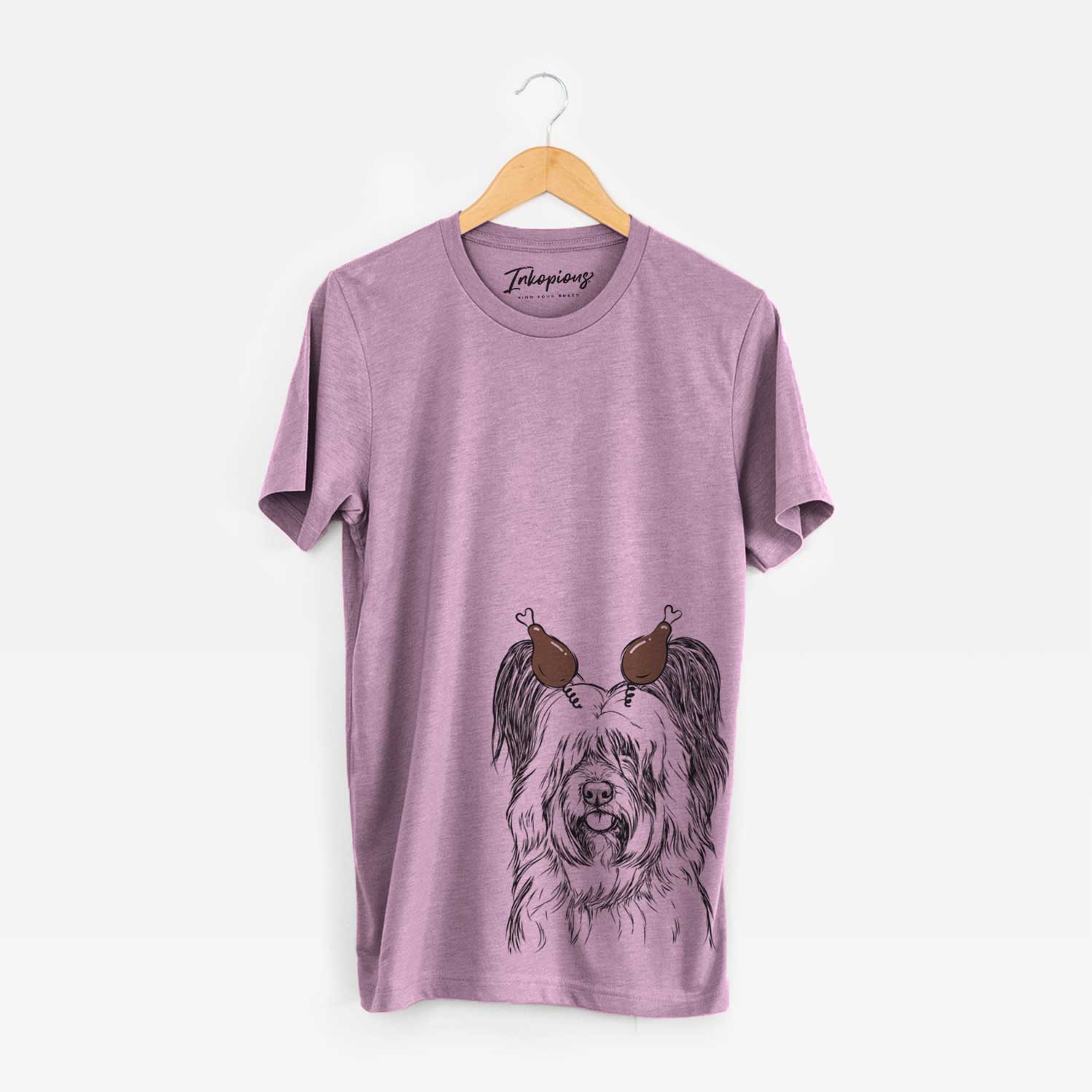 Hand-drawn sketch of Gideon the Skye Terrier with a Thanksgiving turkey headpiece on an Orchid Unisex crewneck