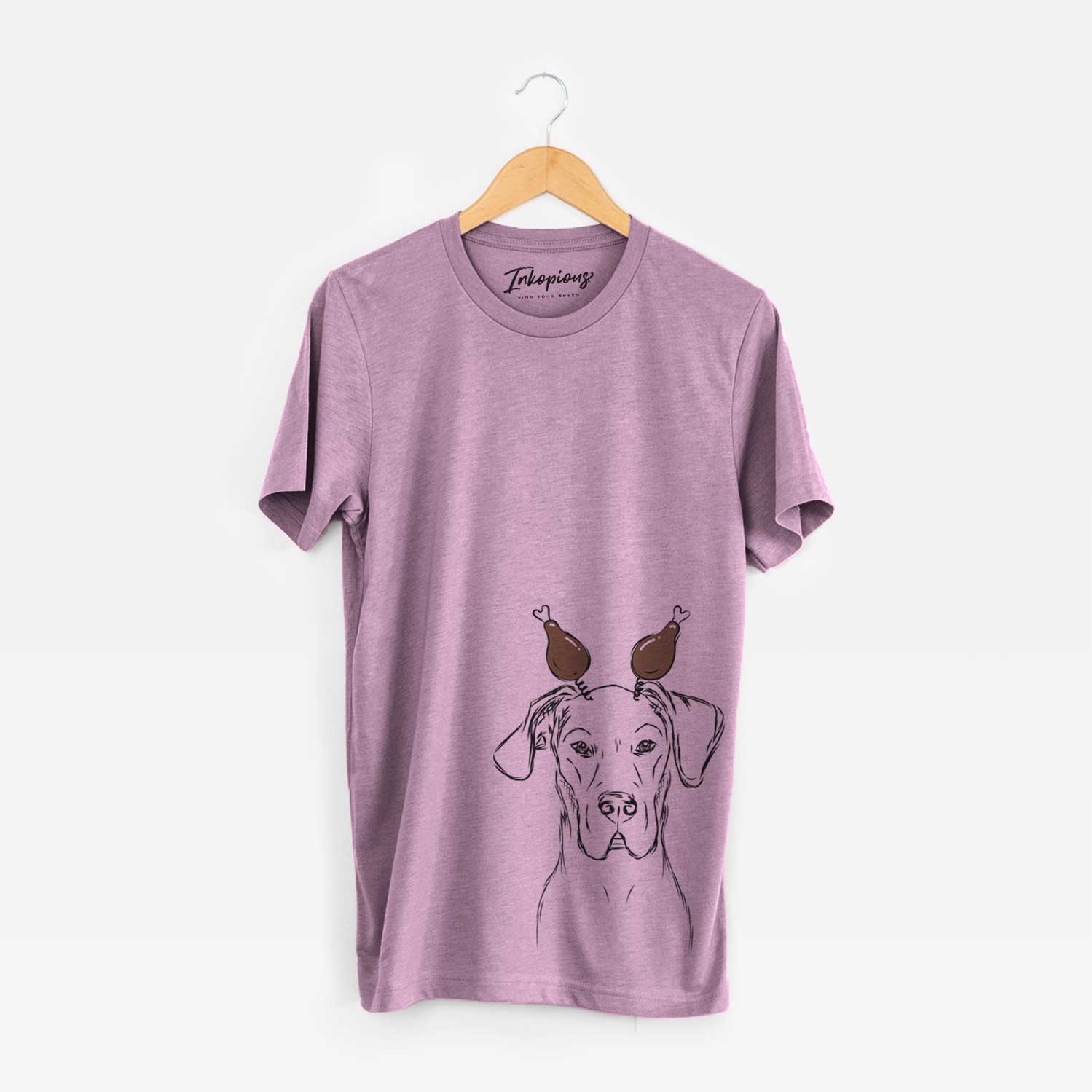 Hand-drawn sketch of Harvey the Great Dane with a Thanksgiving turkey headpiece on an Orchid Unisex crewneck