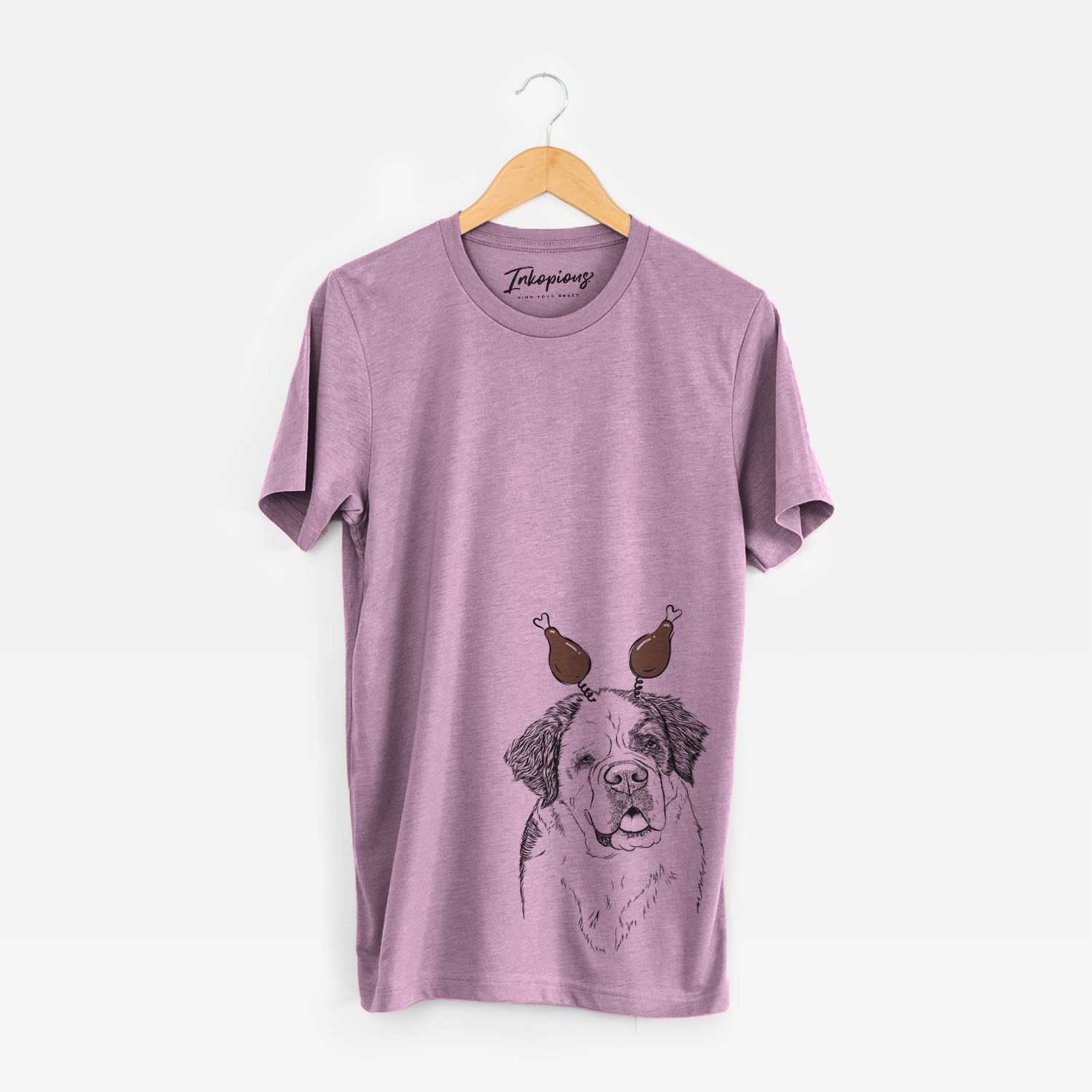 Hand-drawn sketch of Hook the Saint Bernard with a Thanksgiving turkey headpiece on an Orchid Unisex crewneck