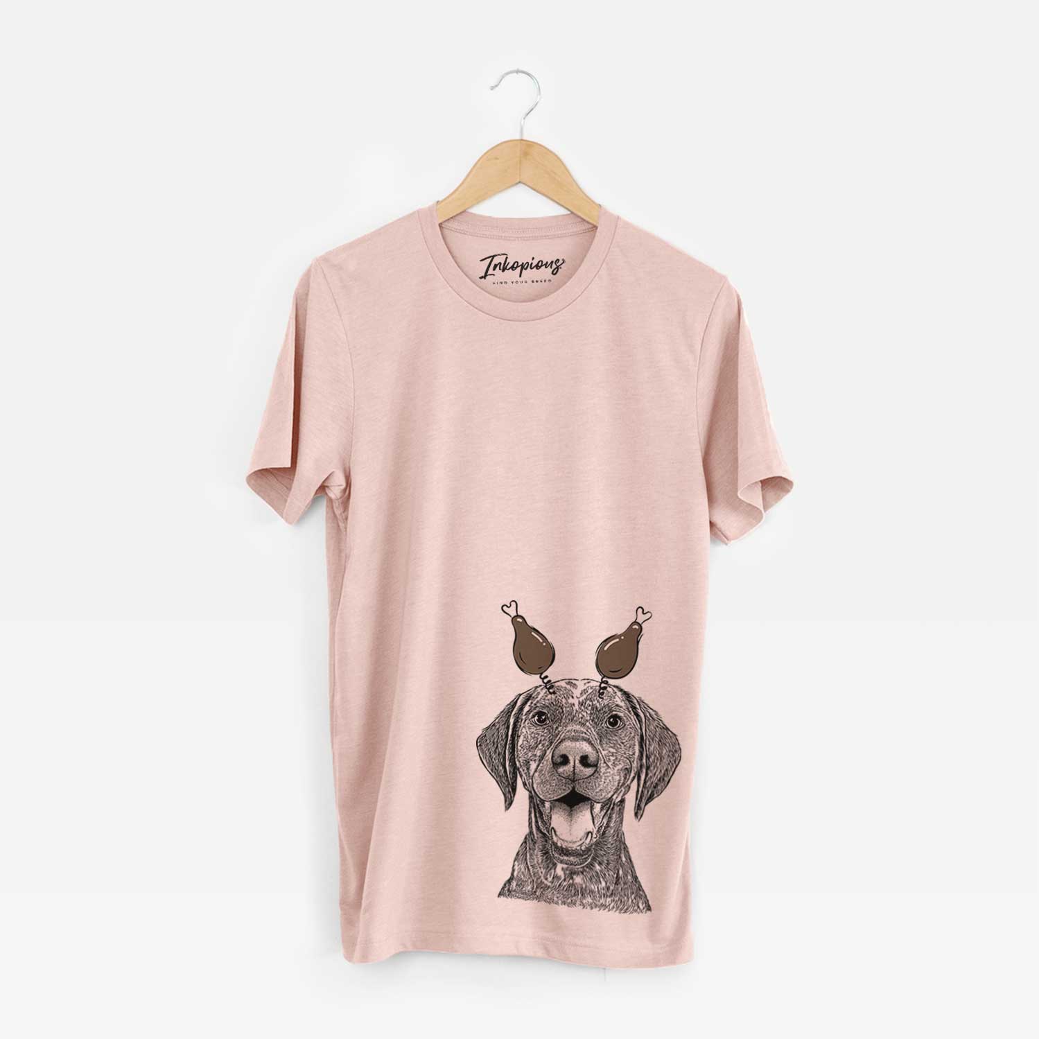 Hand-drawn sketch of Hudson the German Shorthaired Pointer with a Thanksgiving turkey headpiece on a Peach Unisex crewneck