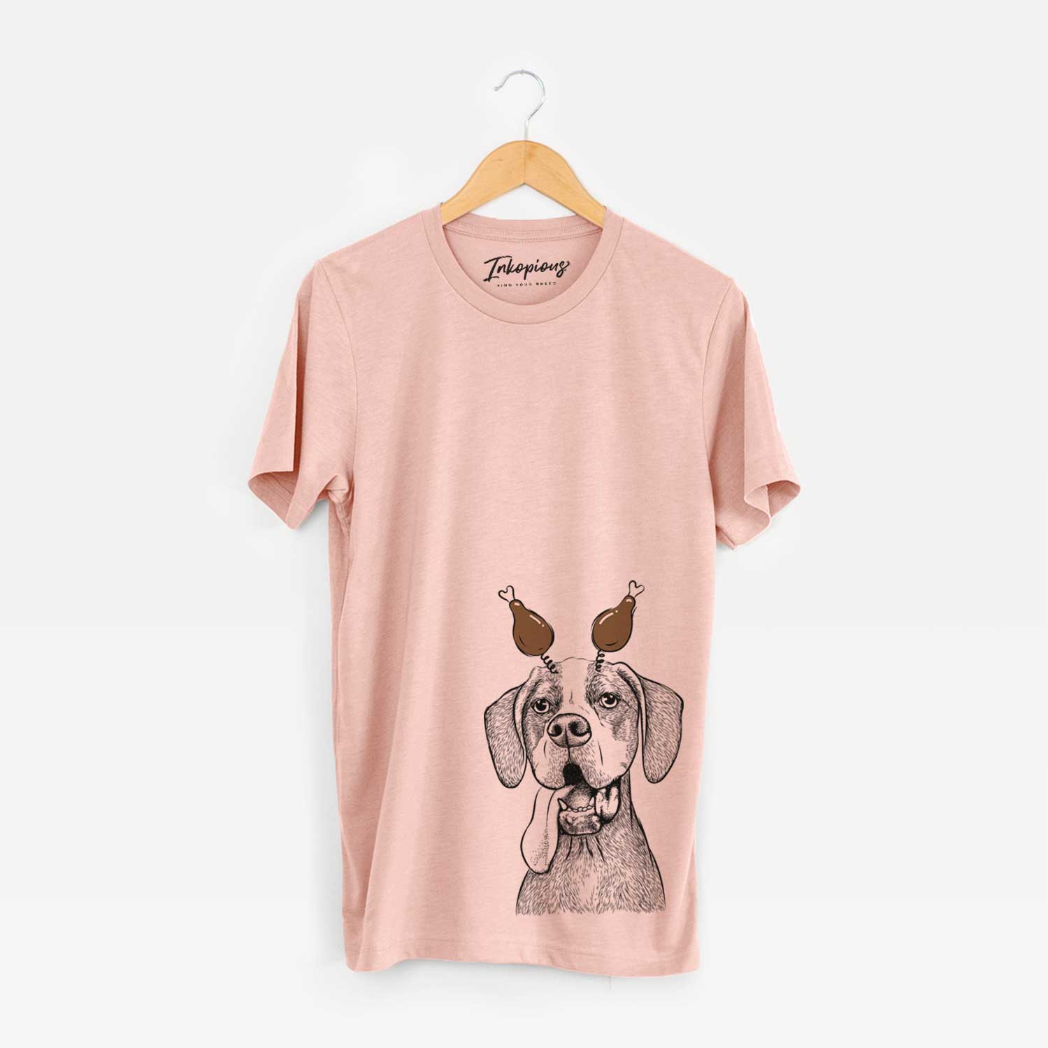 Hand-drawn sketch of Irwin the English Pointer with a Thanksgiving turkey headpiece on a Peach Unisex crewneck