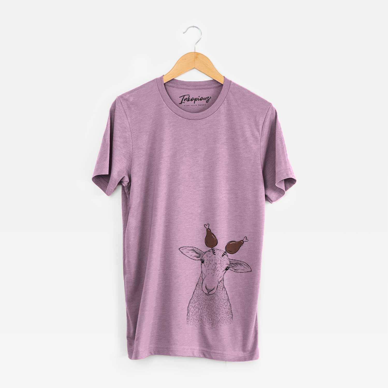 Hand-drawn sketch of Ivy the Lamb with a Thanksgiving turkey headpiece on an Orchid Unisex crewneck