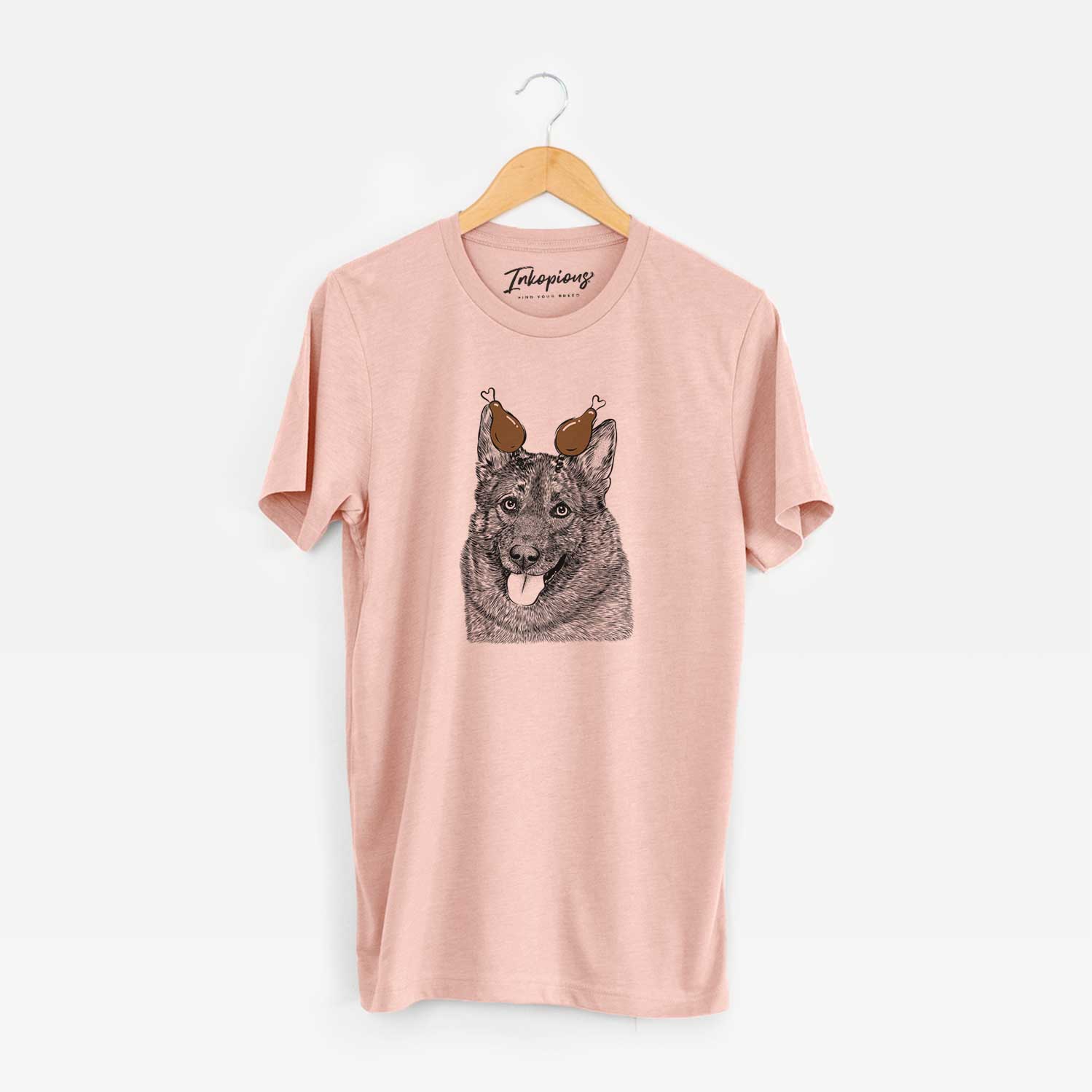 Hand-drawn sketch of Kasia the Norwegian Elkhound with a Thanksgiving turkey headpiece on a Peach Unisex crewneck