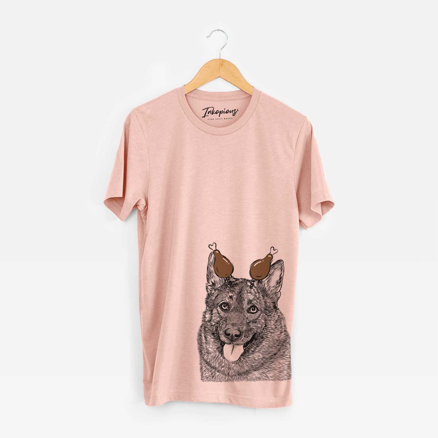 Hand-drawn sketch of Kasia the Norwegian Elkhound with a Thanksgiving turkey headpiece on a Peach Unisex crewneck