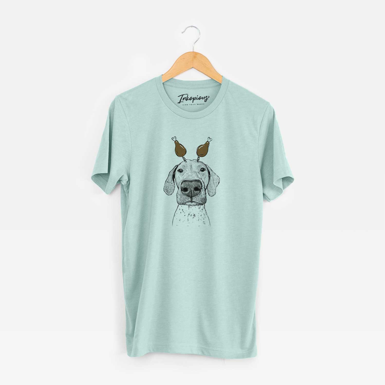 Hand-drawn sketch of Leroy the German Shorthaired Pointer with a Thanksgiving turkey headpiece on a Heather Sage Unisex crewneck