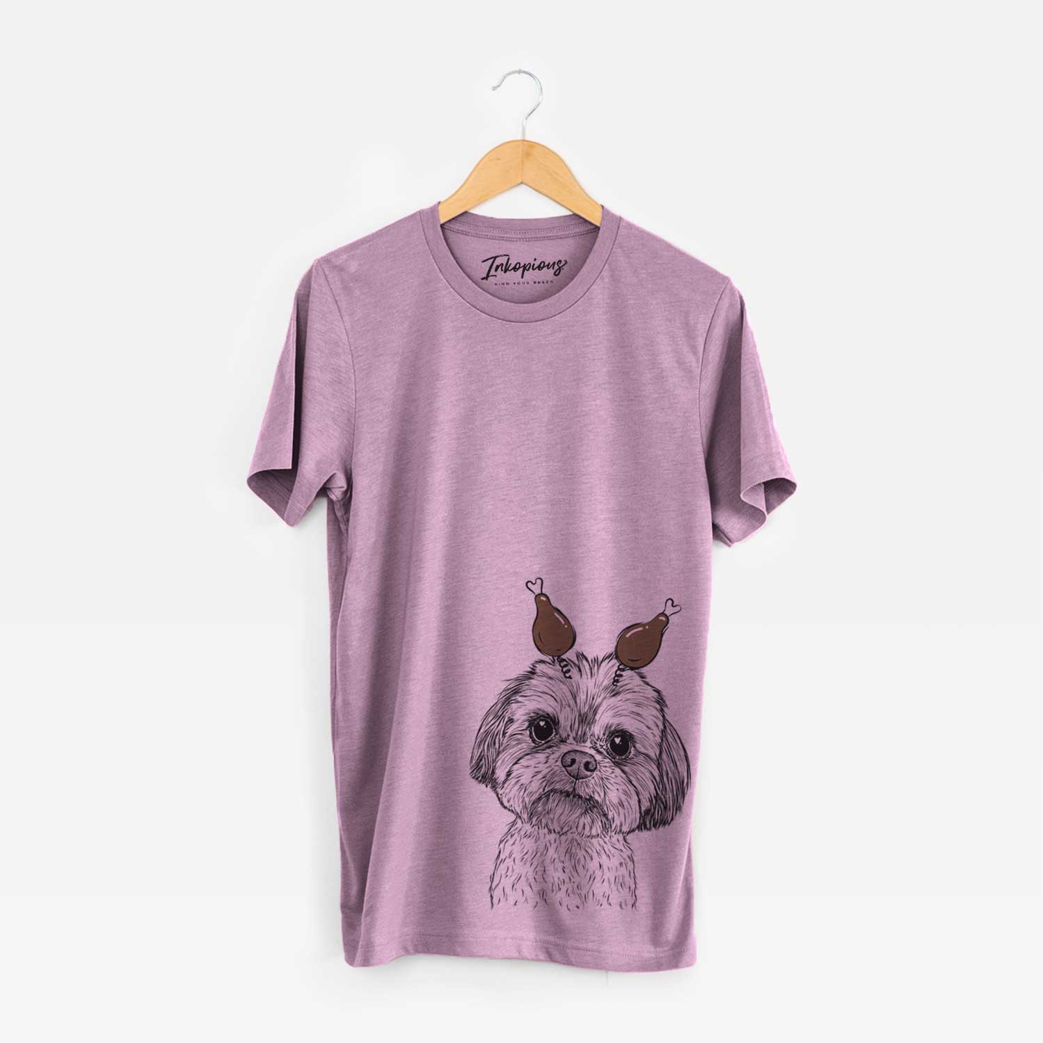 Hand-drawn sketch of Lucy the Shorkie with a Thanksgiving turkey headpiece on an Orchid Unisex crewneck