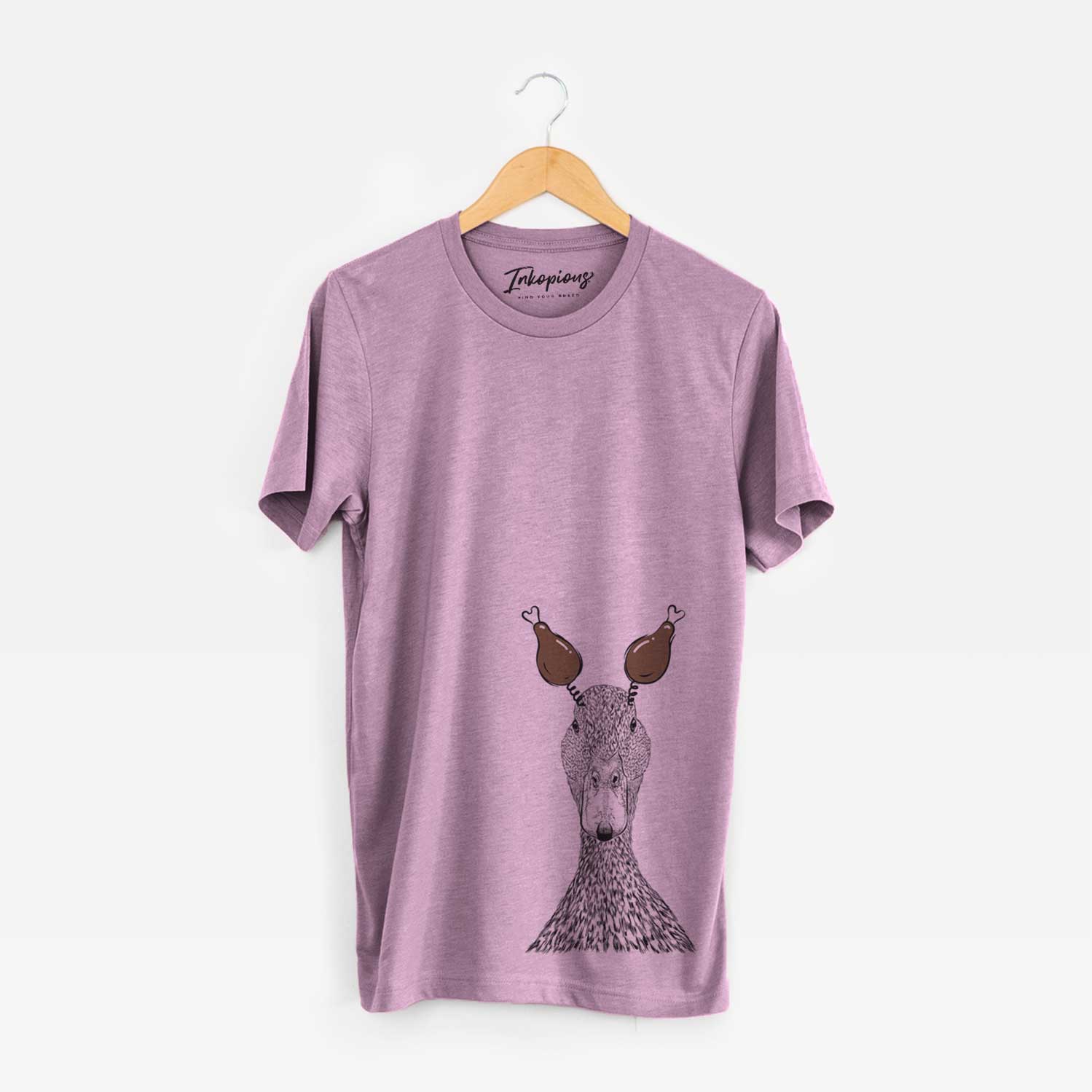 Hand-drawn sketch of Marge the Mallard Duck with a Thanksgiving turkey headpiece on an Orchid Unisex crewneck