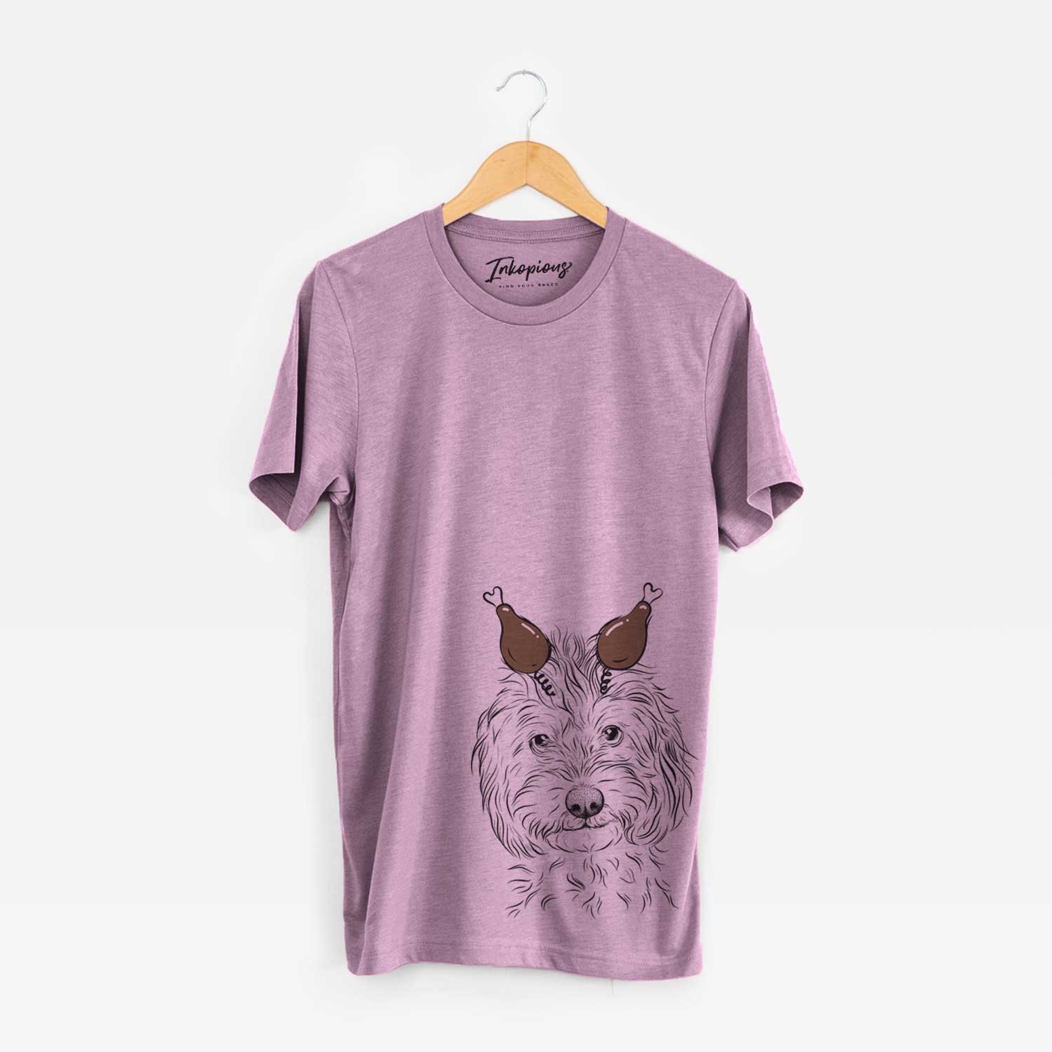 Hand-drawn sketch of Mason the Cavapoo with a Thanksgiving turkey headpiece on an Orchid Unisex crewneck