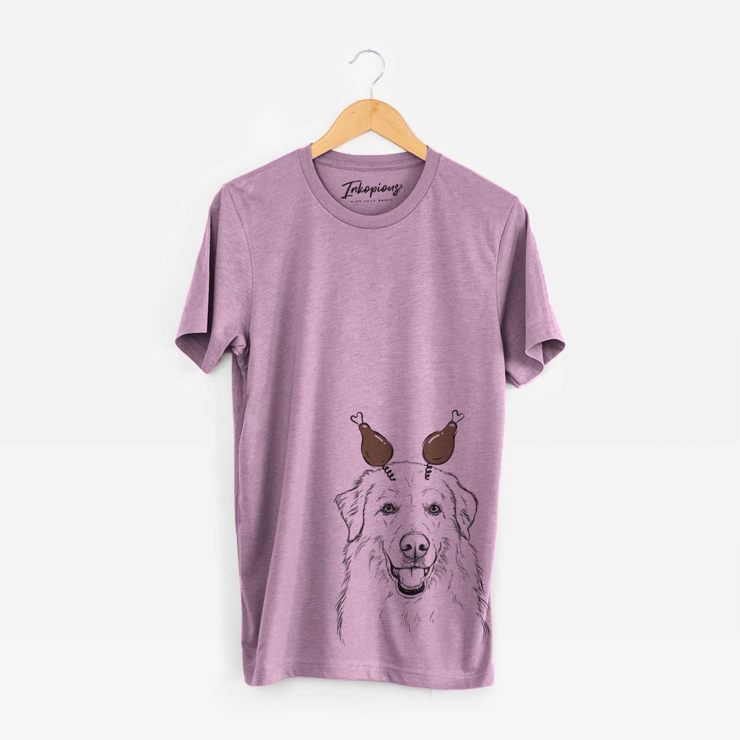 Hand-drawn sketch of Meg the Great Pyrenees with a Thanksgiving turkey headpiece on an Orchid Unisex crewneck