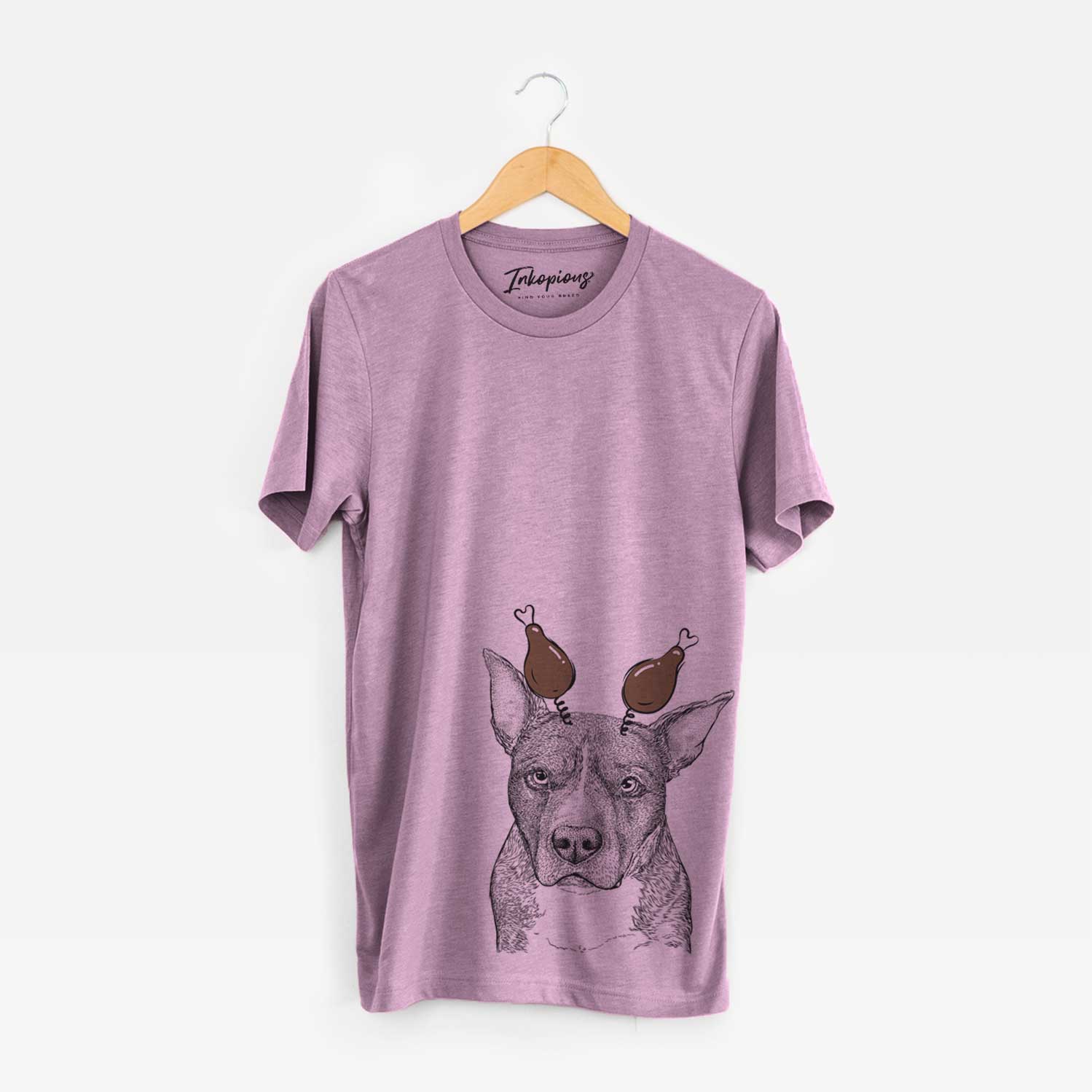 Hand-drawn sketch of Mercy the Pitbull with a Thanksgiving turkey headpiece on an Orchid Unisex crewneck