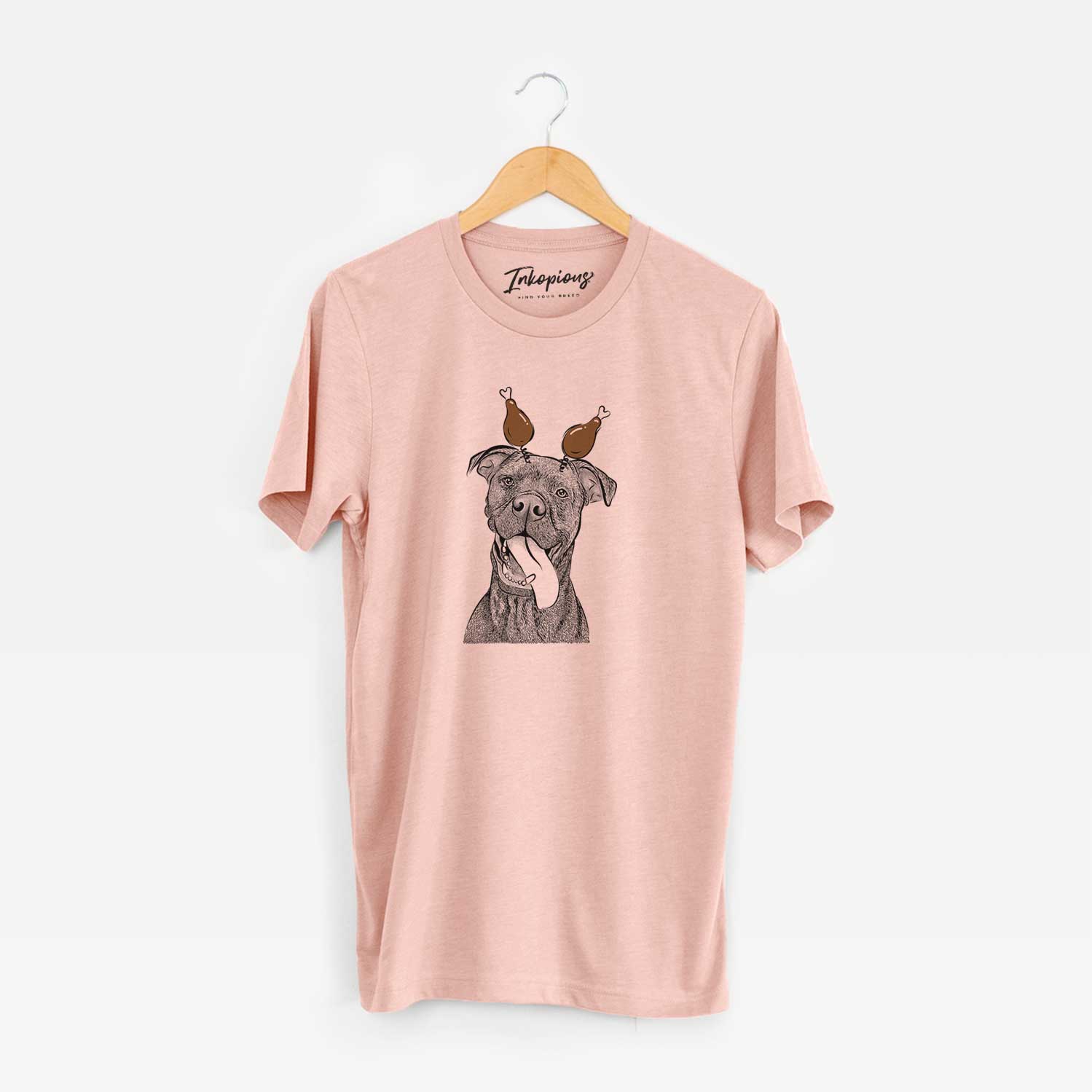 Hand-drawn sketch of Mikey the Boxador with a Thanksgiving turkey headpiece on a Peach Unisex crewneck