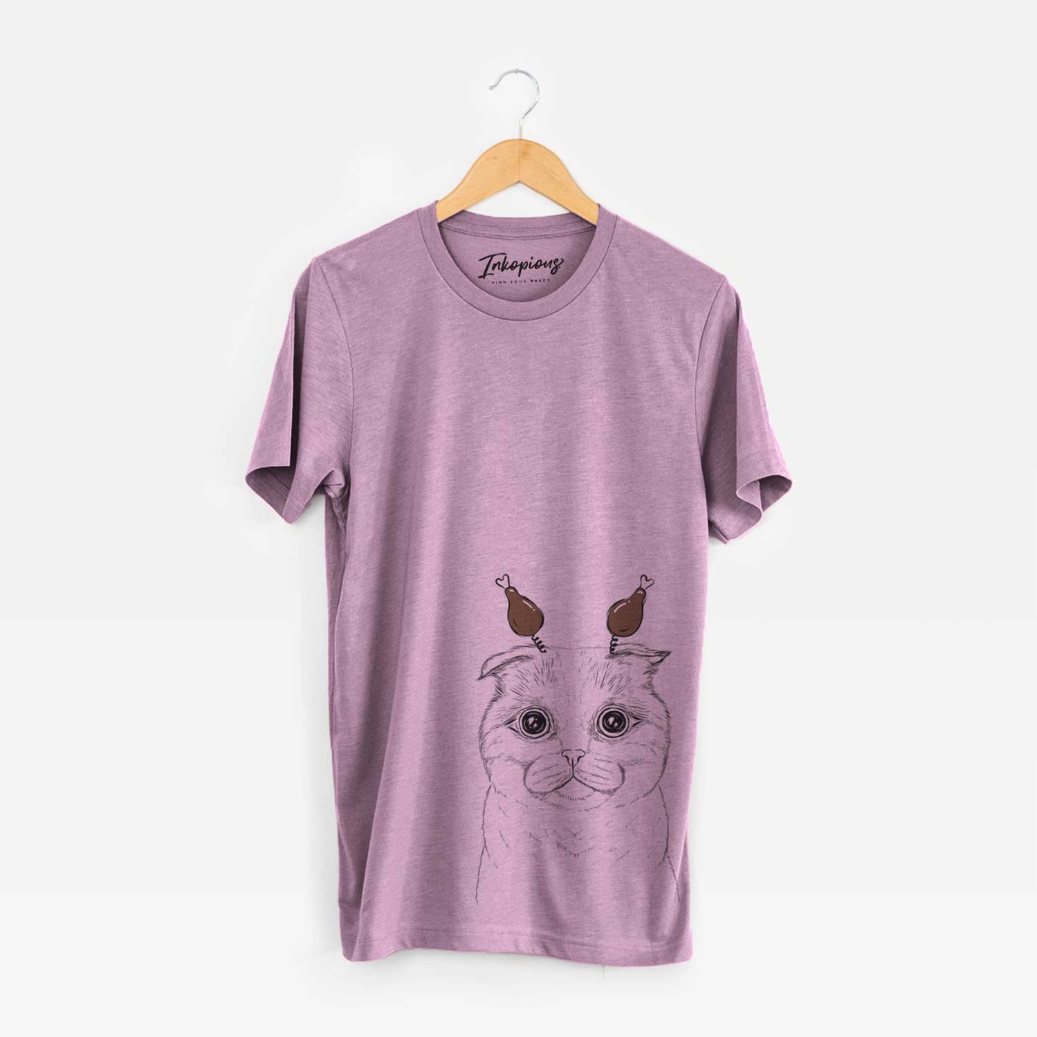 Hand-drawn sketch of Neko the Scottish Fold Cat with a Thanksgiving turkey headpiece on an Orchid Unisex crewneck