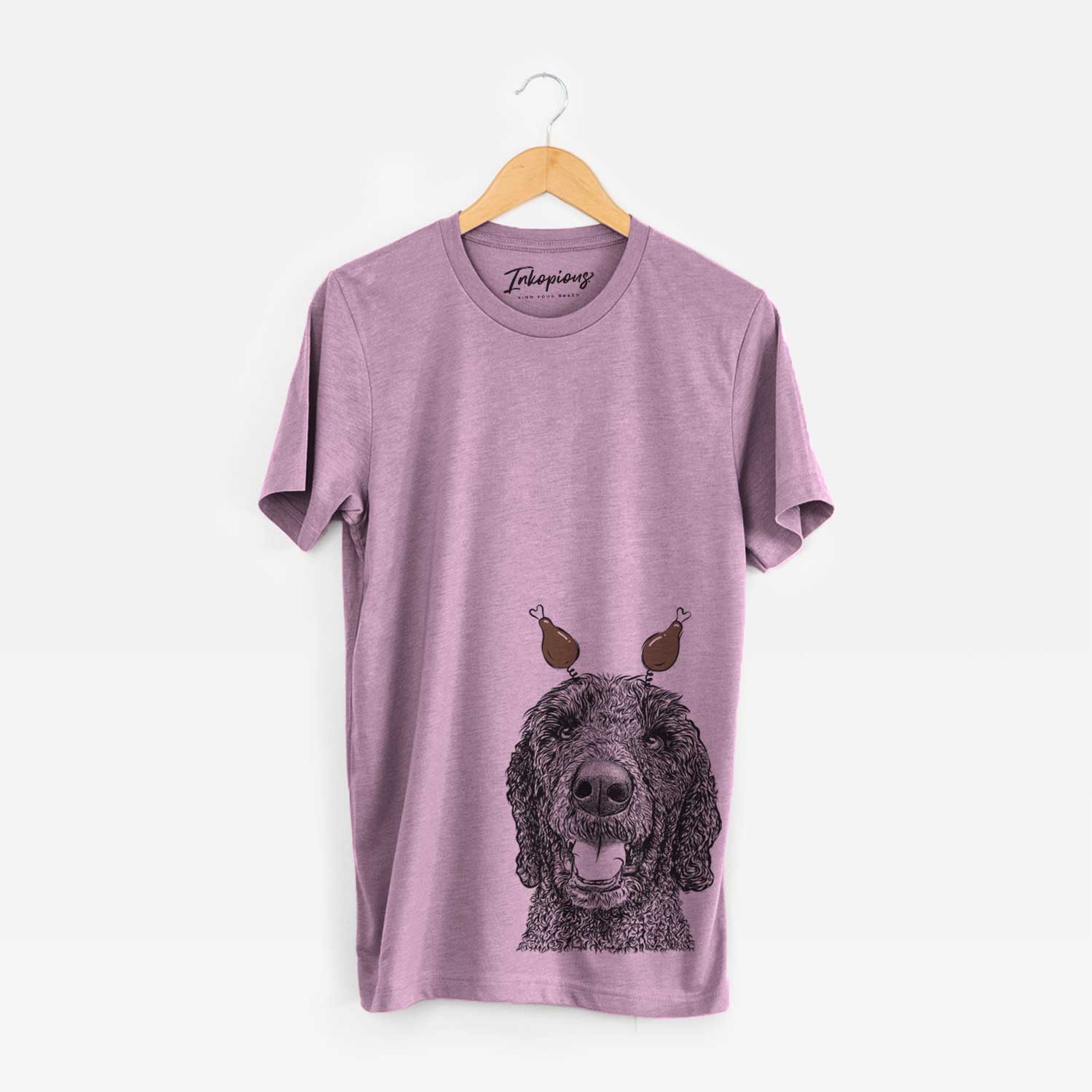 Hand-drawn sketch of Obi James the Goldendoodle with a Thanksgiving turkey headpiece on an Orchid Unisex crewneck