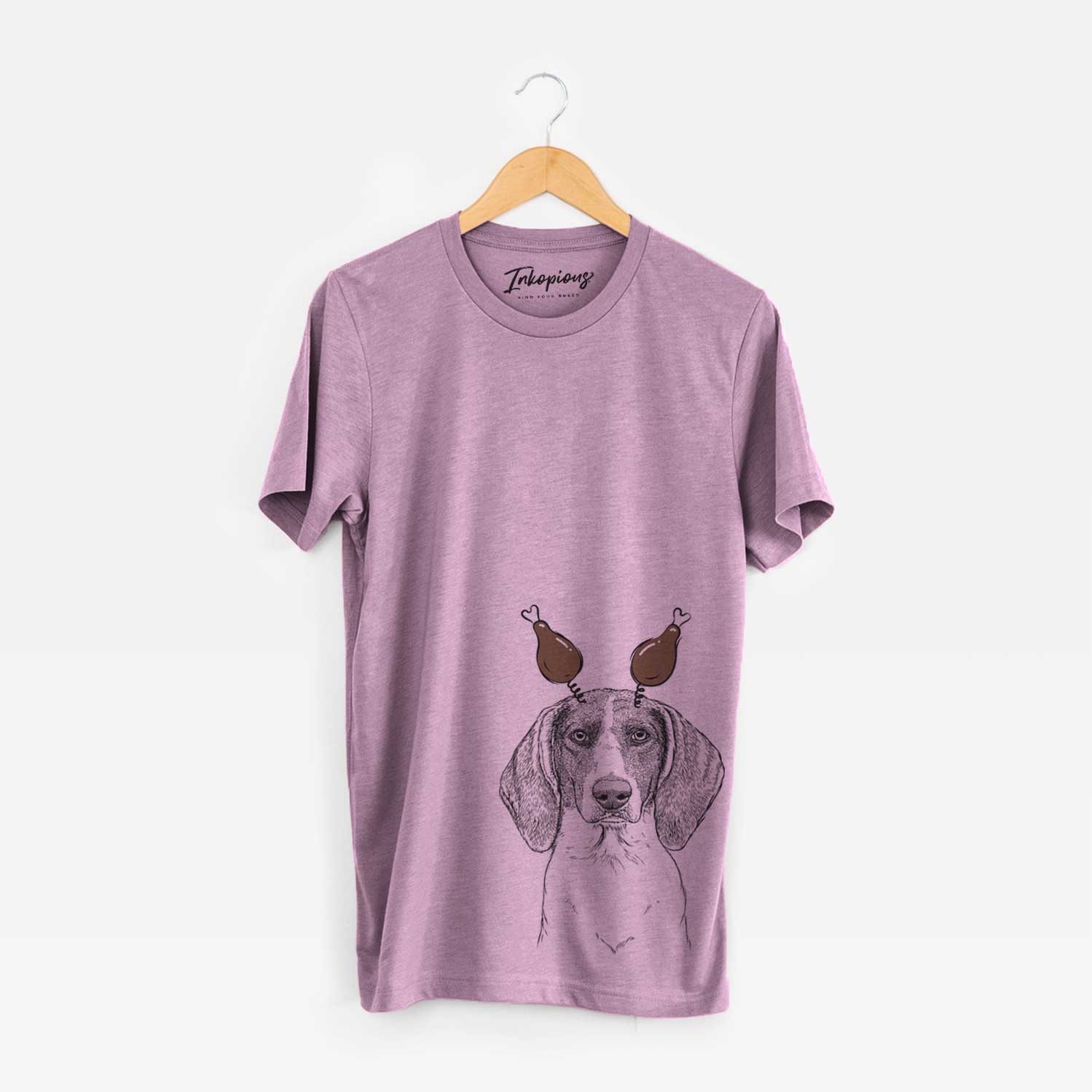 Hand-drawn sketch of Orin the Treeing Walker Coonhound with a Thanksgiving turkey headpiece on an Orchid Unisex crewneck