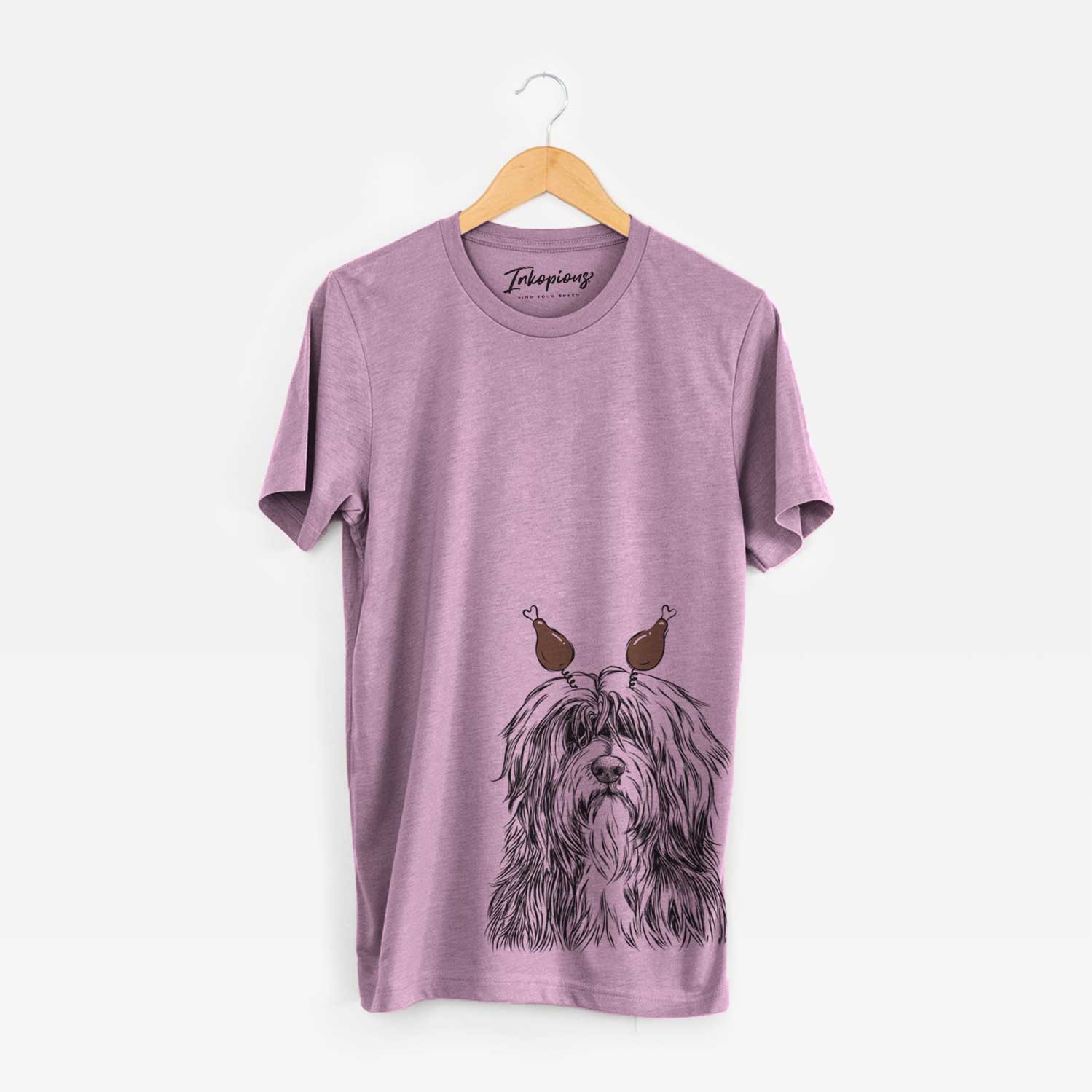 Hand-drawn sketch of Otto the Polish Lowland Sheepdog with a Thanksgiving turkey headpiece on an Orchid Unisex crewneck