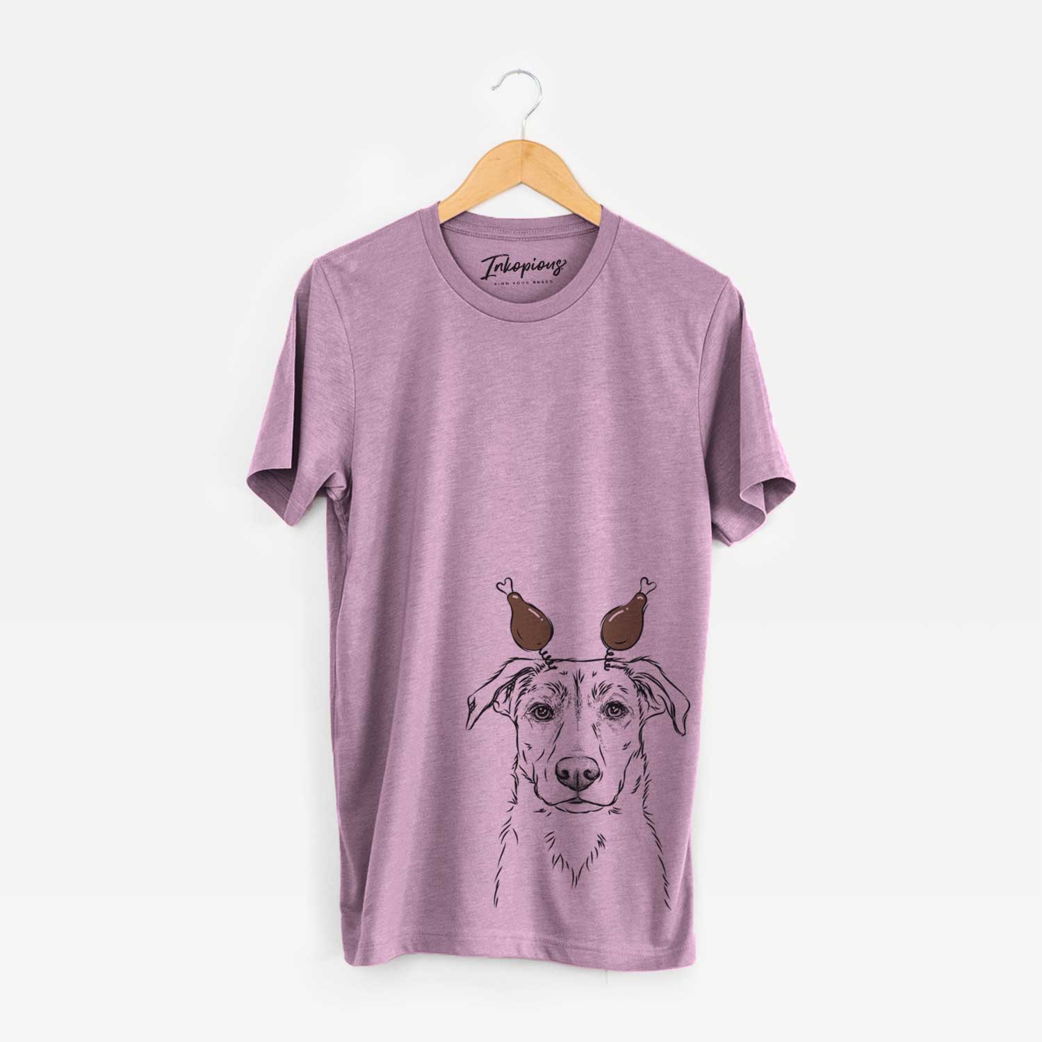 Hand-drawn sketch of Peanut the Lab Mix with a Thanksgiving turkey headpiece on an Orchid Unisex crewneck