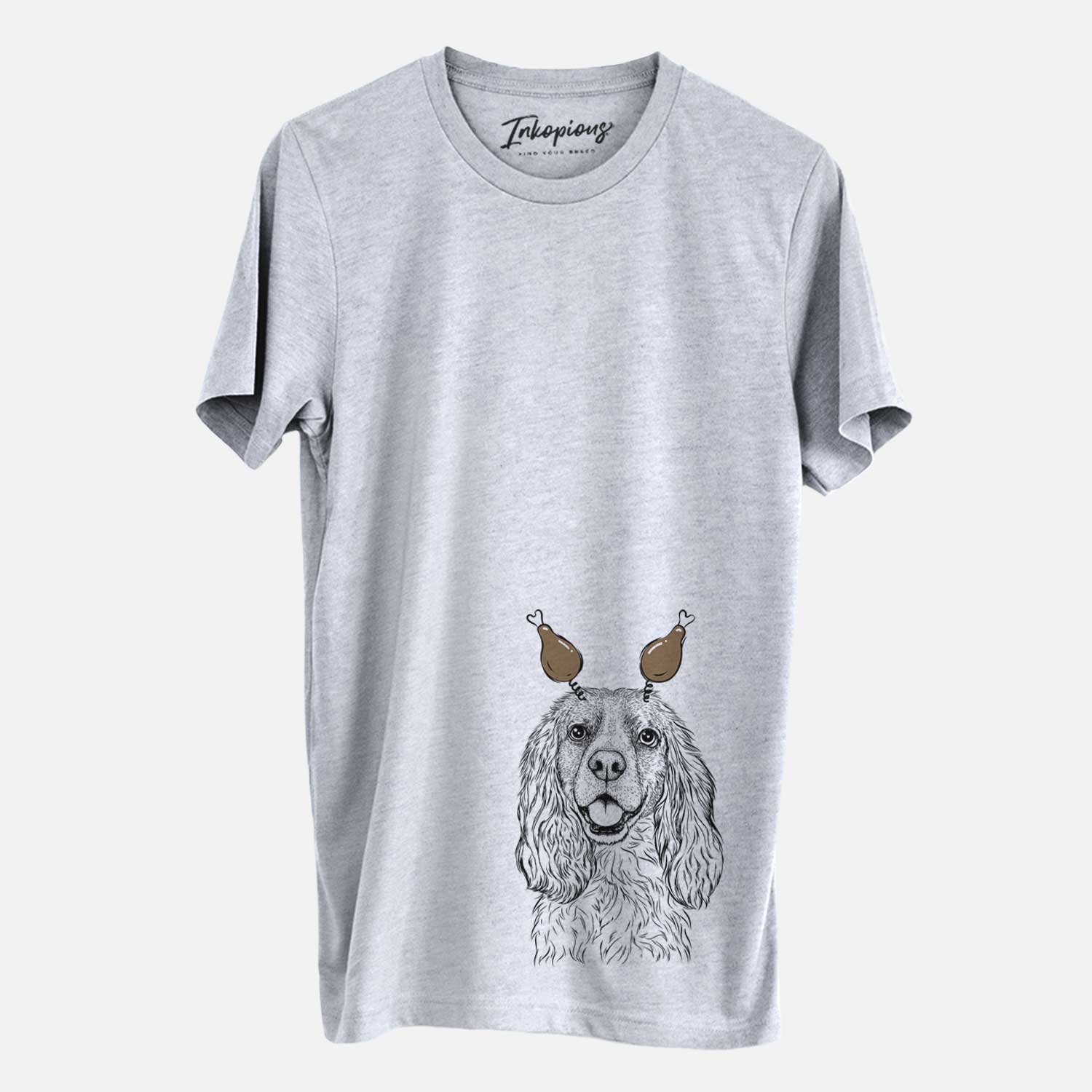 Hand-drawn sketch of Perry the Cockalier with a Thanksgiving turkey headpiece on a Grey Unisex crewneck