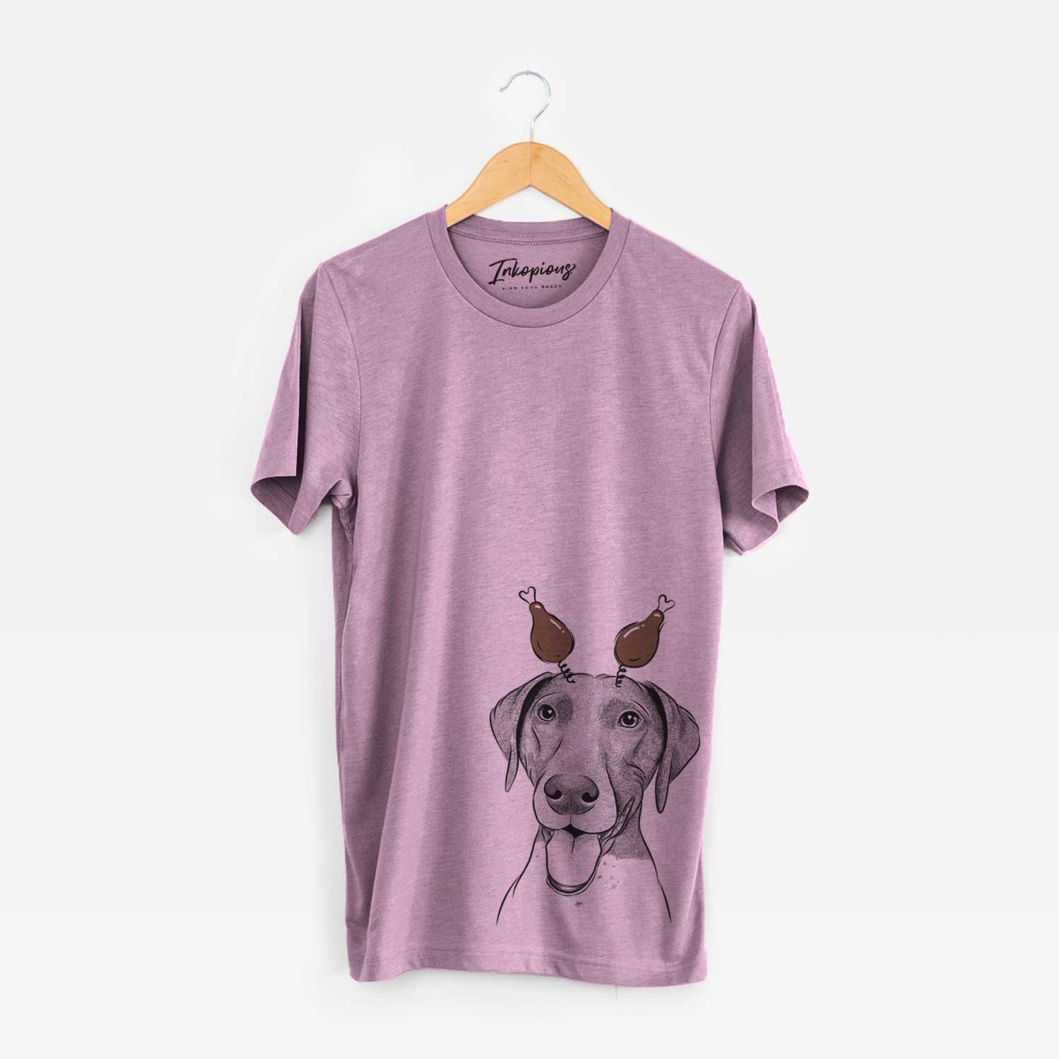 Hand-drawn sketch of Remi the German Shorthaired Pointer with a Thanksgiving turkey headpiece on an Orchid Unisex crewneck