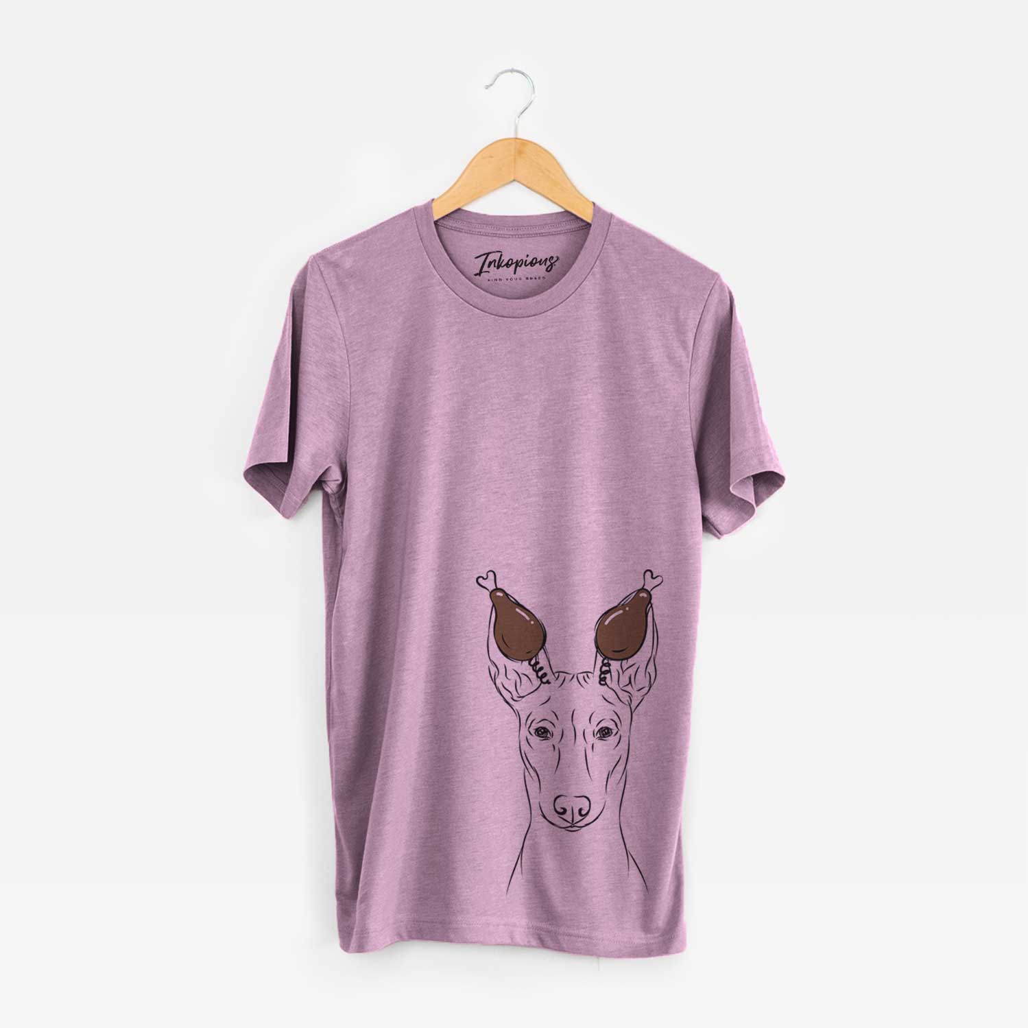 Hand-drawn sketch of Ruadh the Pharaoh Hound with a Thanksgiving turkey headpiece on an Orchid Unisex crewneck