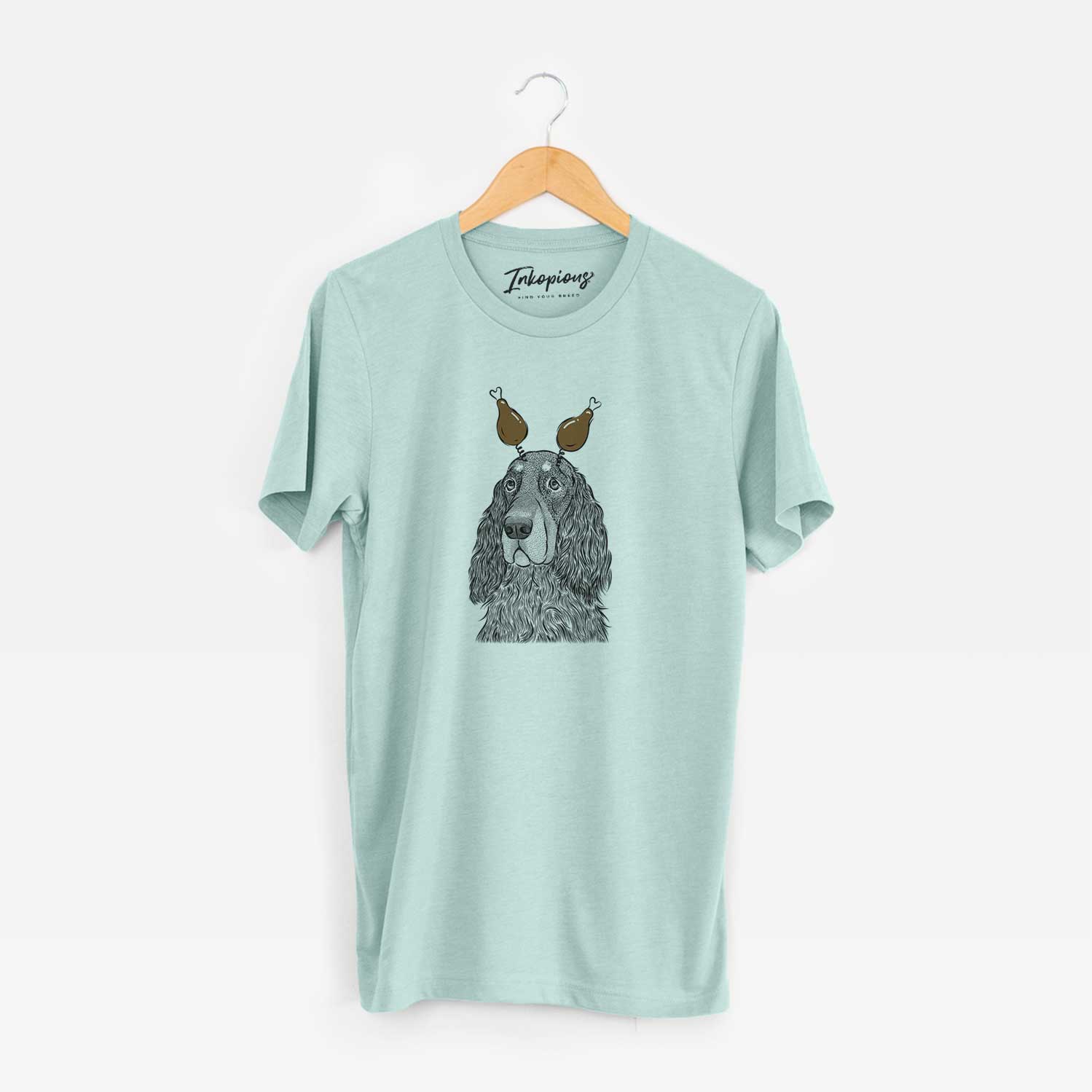Hand-drawn sketch of Stormy the Gordon Setter with a Thanksgiving turkey headpiece on a Heather Sage Unisex crewneck
