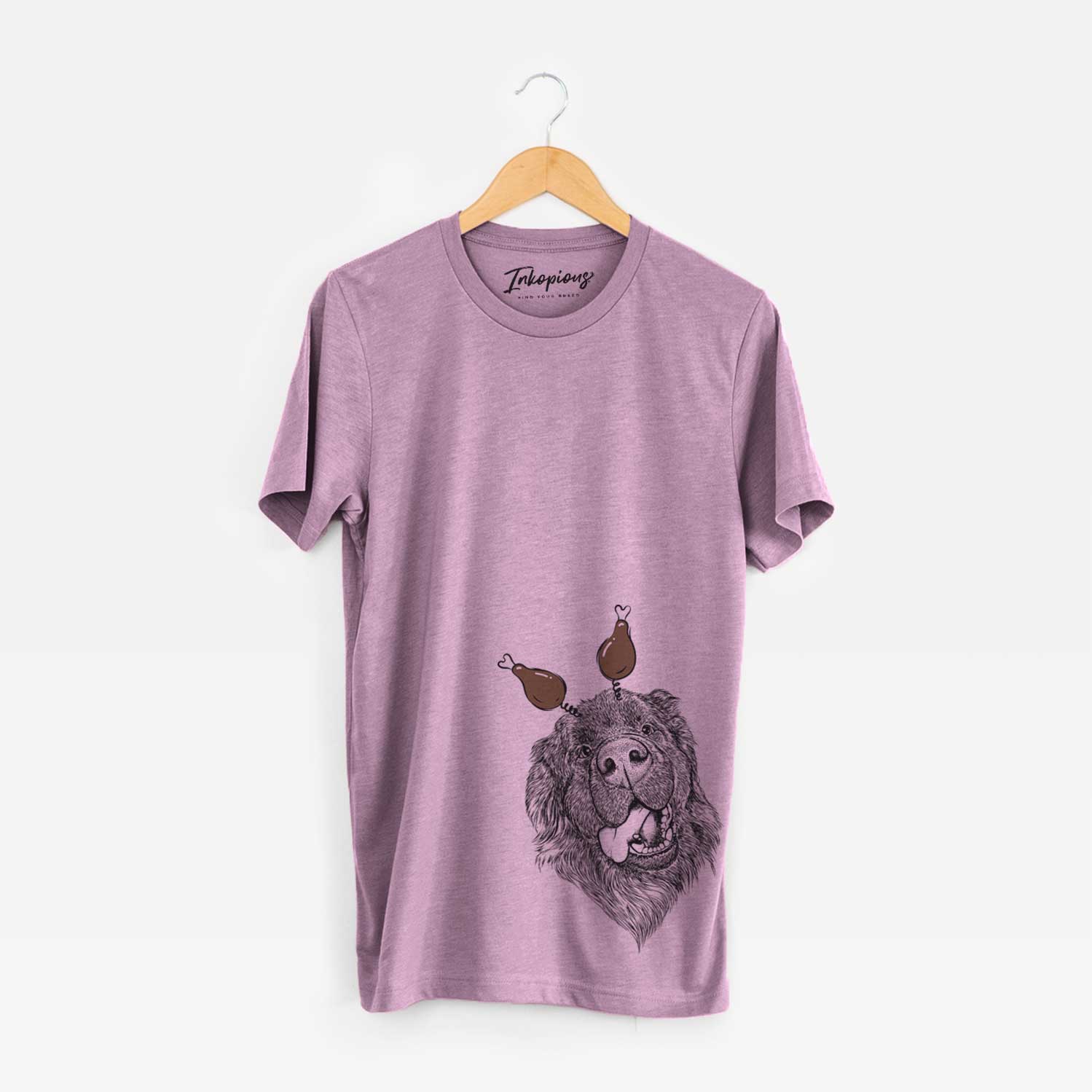Hand-drawn sketch of Tuna the Newfoundland with a Thanksgiving turkey headpiece on an Orchid Unisex crewneck