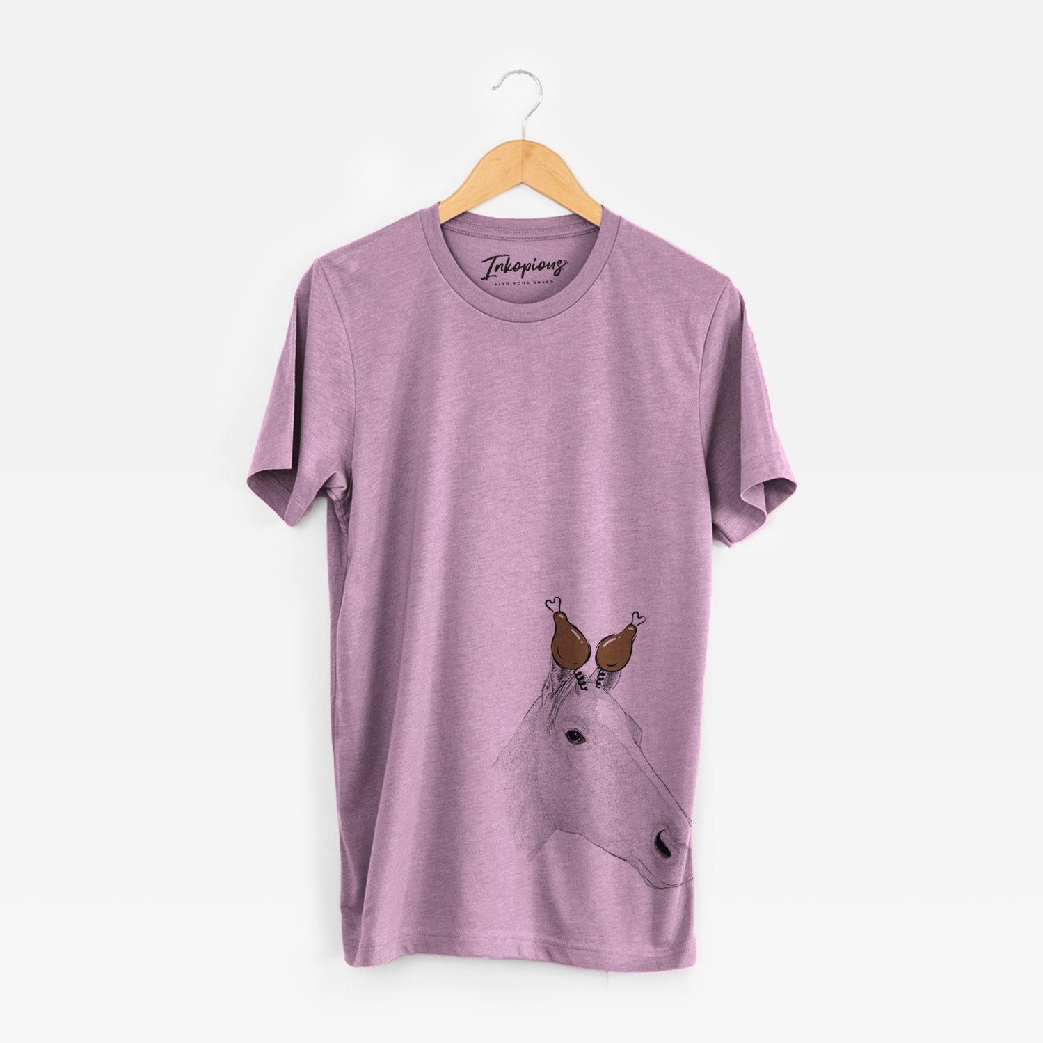 Hand-drawn sketch of Westley the Horse with a Thanksgiving turkey headpiece on an Orchid Unisex crewneck