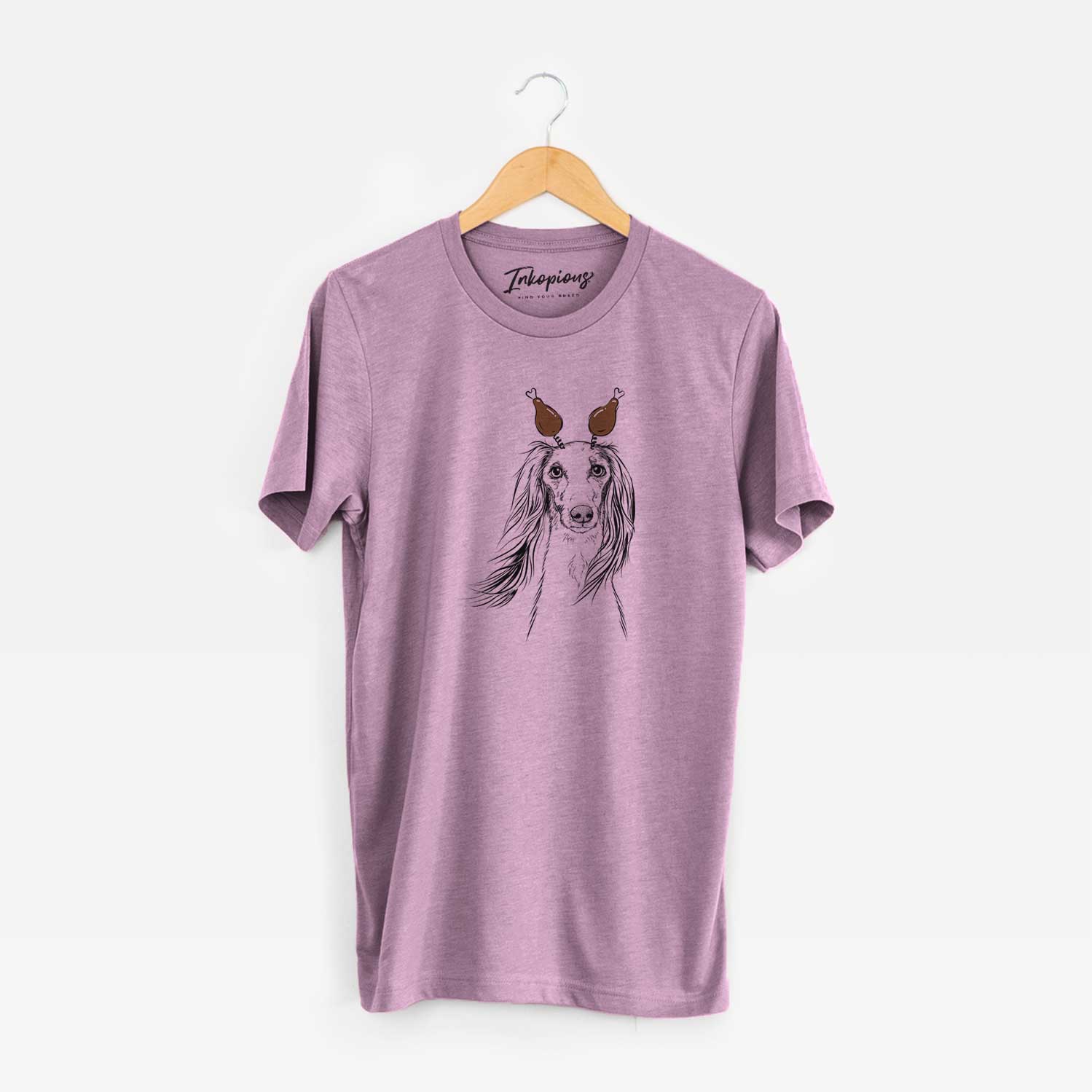 Hand-drawn sketch of Zahra the Saluki with a Thanksgiving turkey headpiece on an Orchid Unisex crewneck