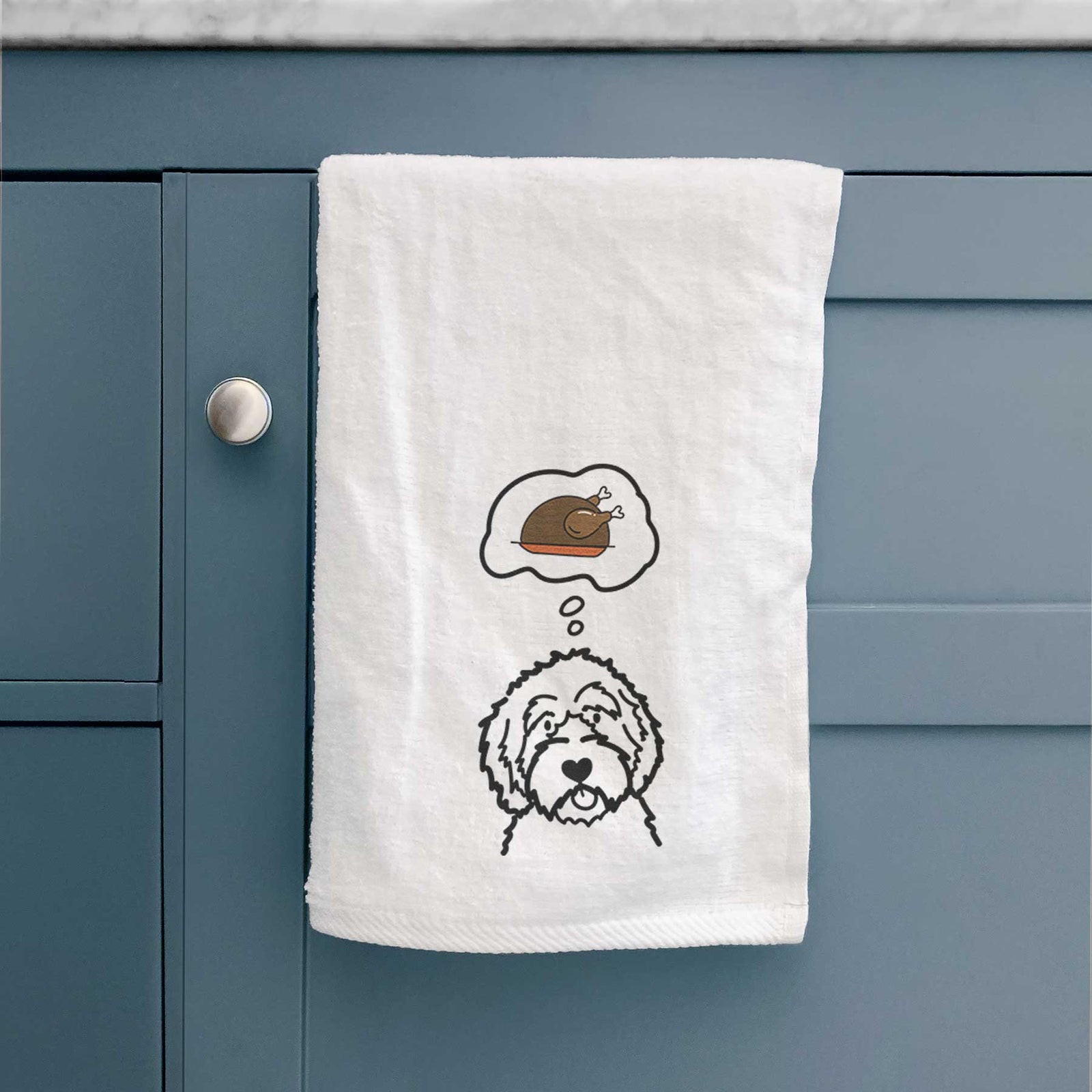Minimalist line drawing of an Aussiedoodle with a little turkey on a decorative hand towel