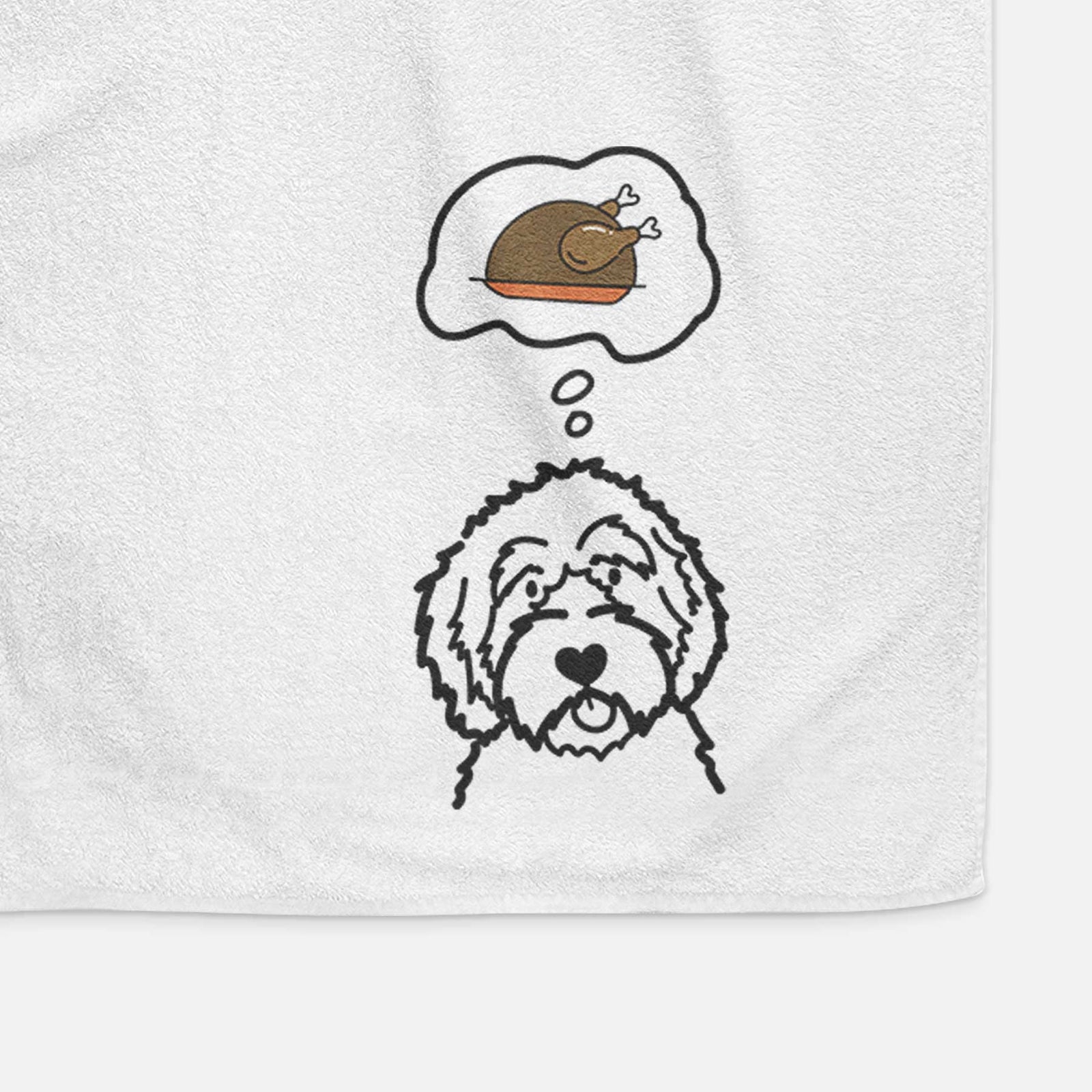 Minimalist line drawing of an Aussiedoodle with a little turkey on a decorative hand towel
