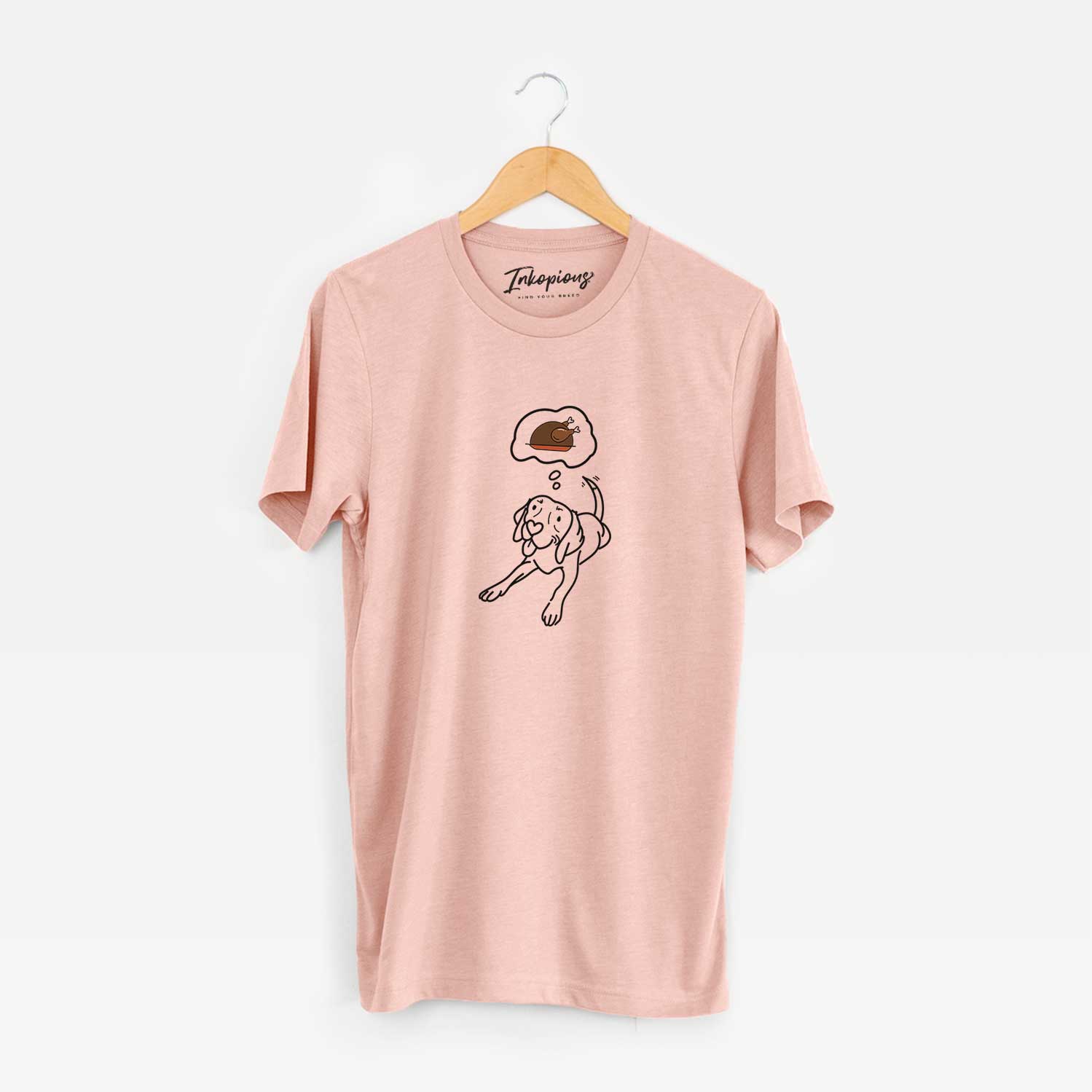 Minimalist line drawing of Bagel the Beagle with a little turkey on a Peach Unisex crewneck