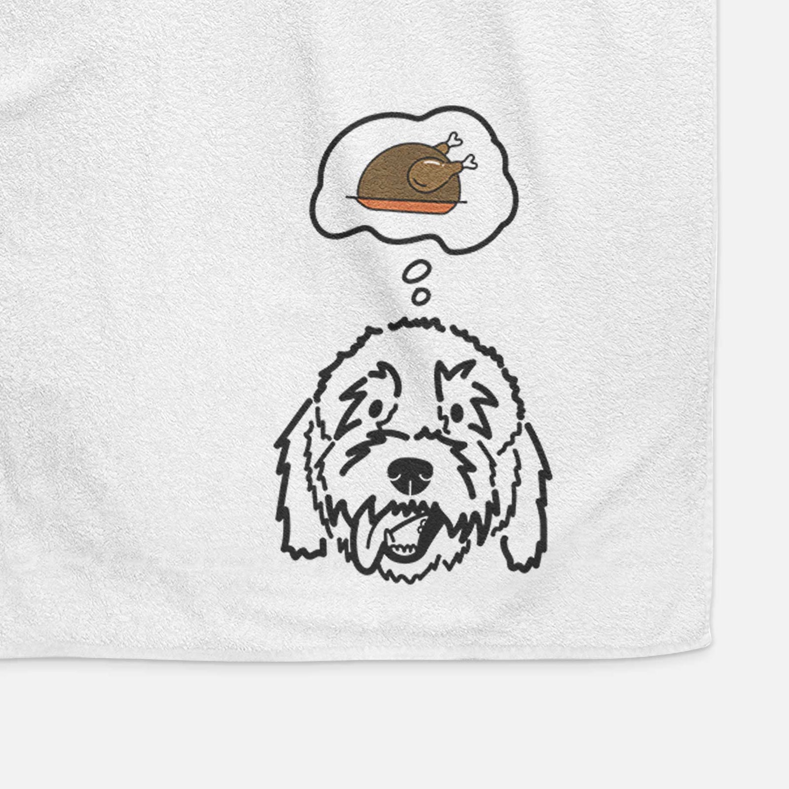 Minimalist line drawing of Barry the Goldendoodle with a little turkey on a decorative hand towel