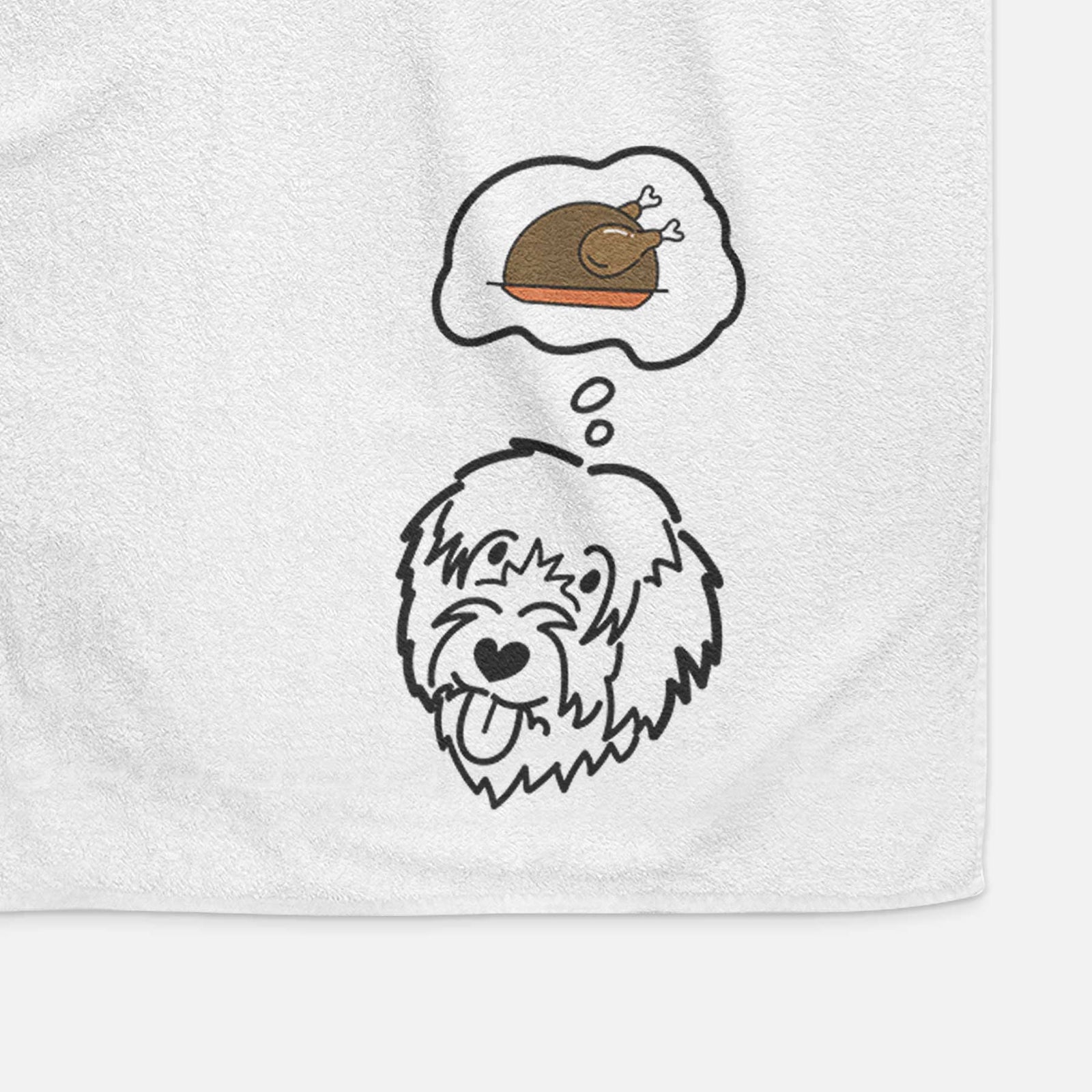 Minimalist line drawing of a Catalan Sheepdog with a little turkey on a decorative hand towel
