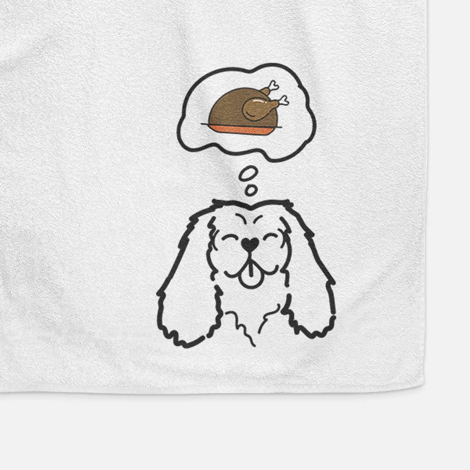 Minimalist line drawing of a Cavalier King Charles Spaniel with a little turkey on a decorative hand towel