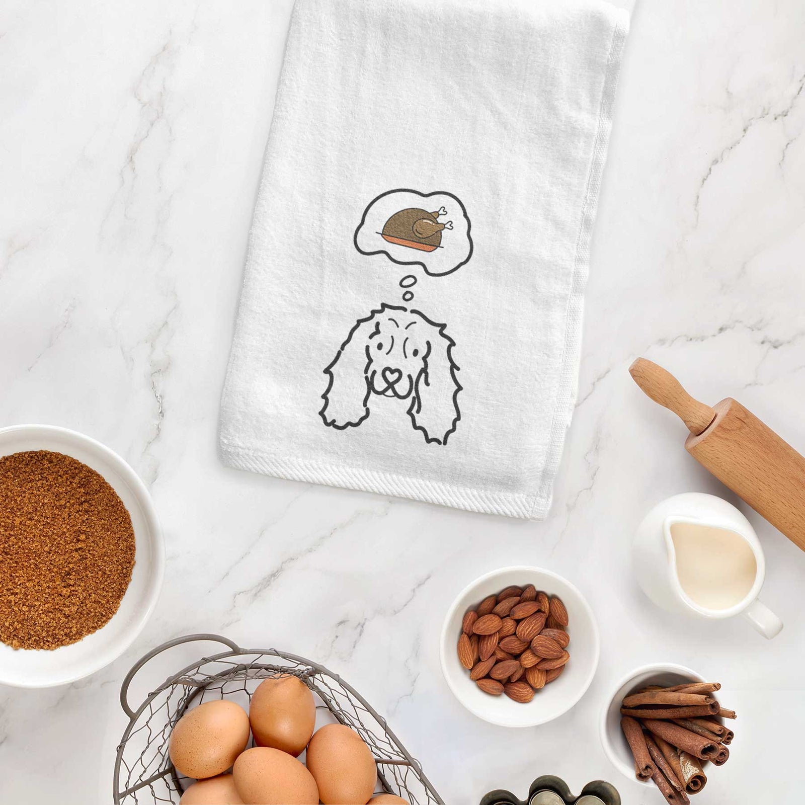 Minimalist line drawing of an American Cocker Spaniel with a little turkey on a decorative hand towel