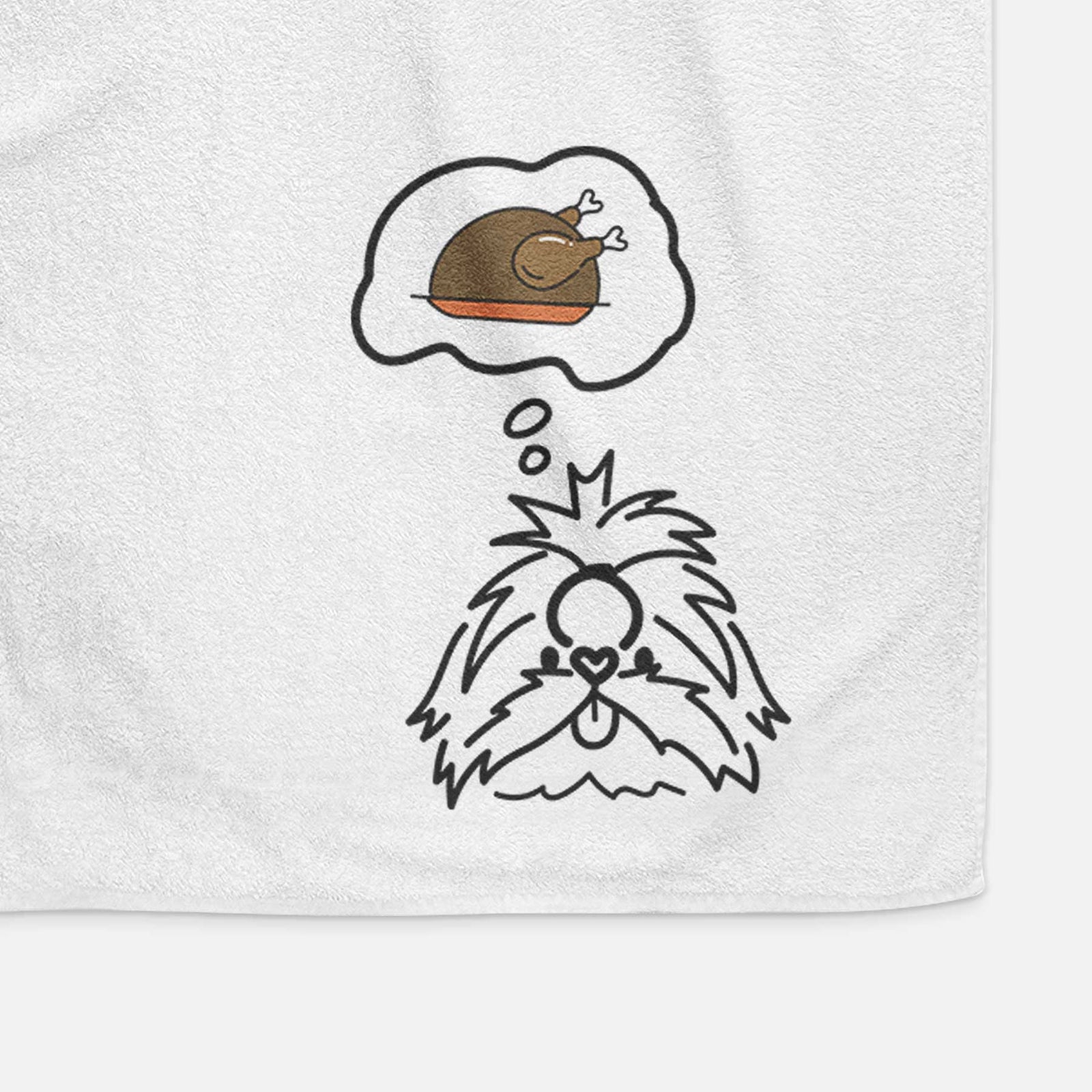 Minimalist line drawing of CoCo the Shih Tzu with a little turkey on a decorative hand towel