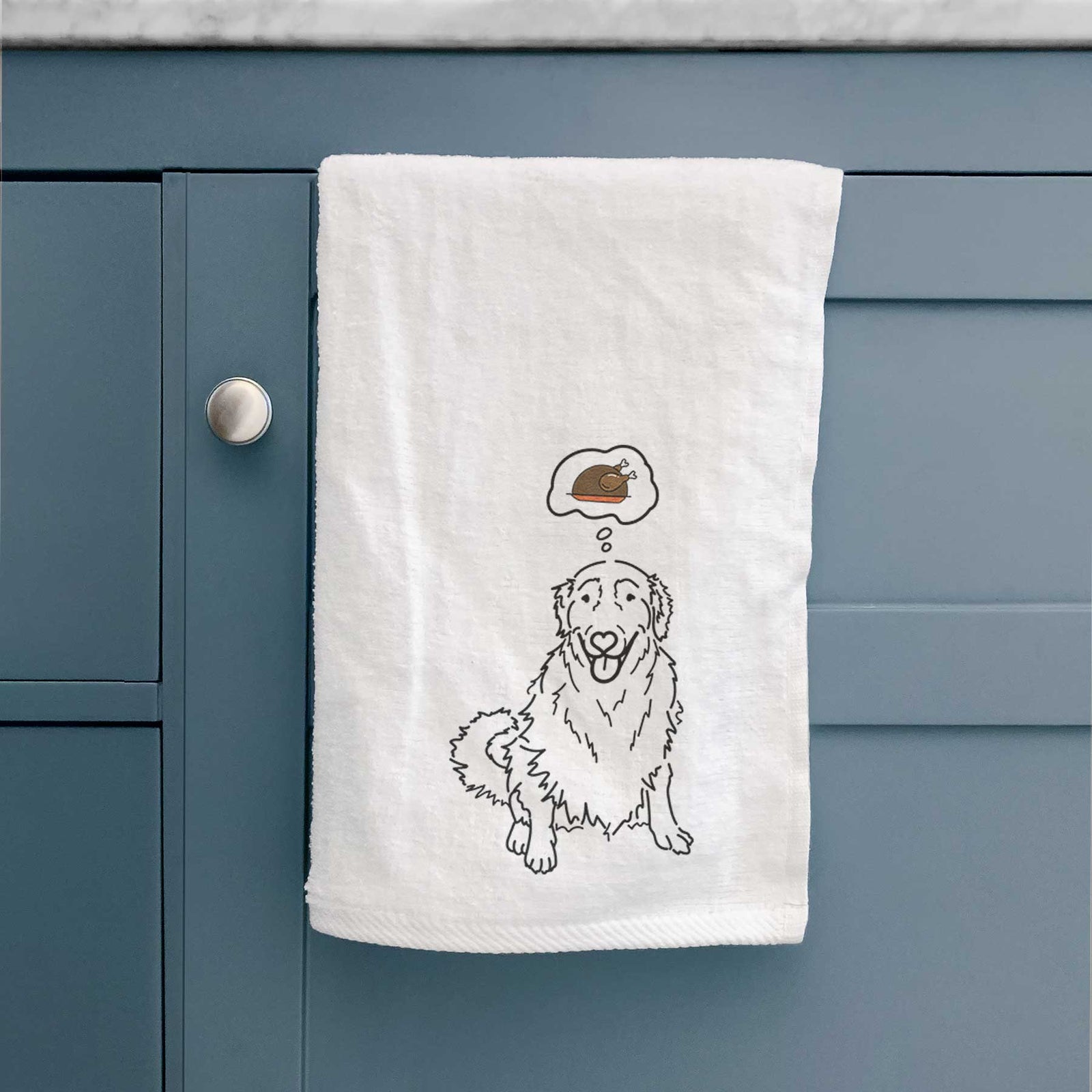 Minimalist line drawing of Daisy the Golden Retriever with a little turkey on a decorative hand towel
