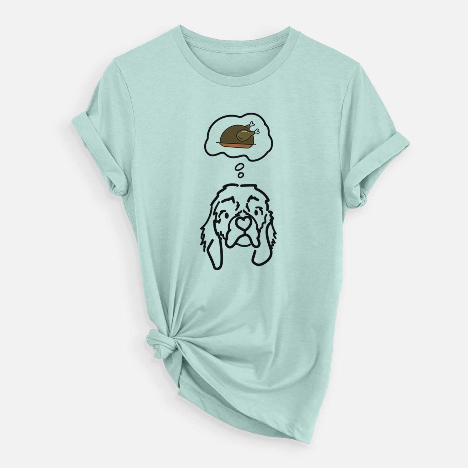 Minimalist line drawing of GiGi the Cocker Spaniel with a little turkey on a Heather Sage Unisex crewneck