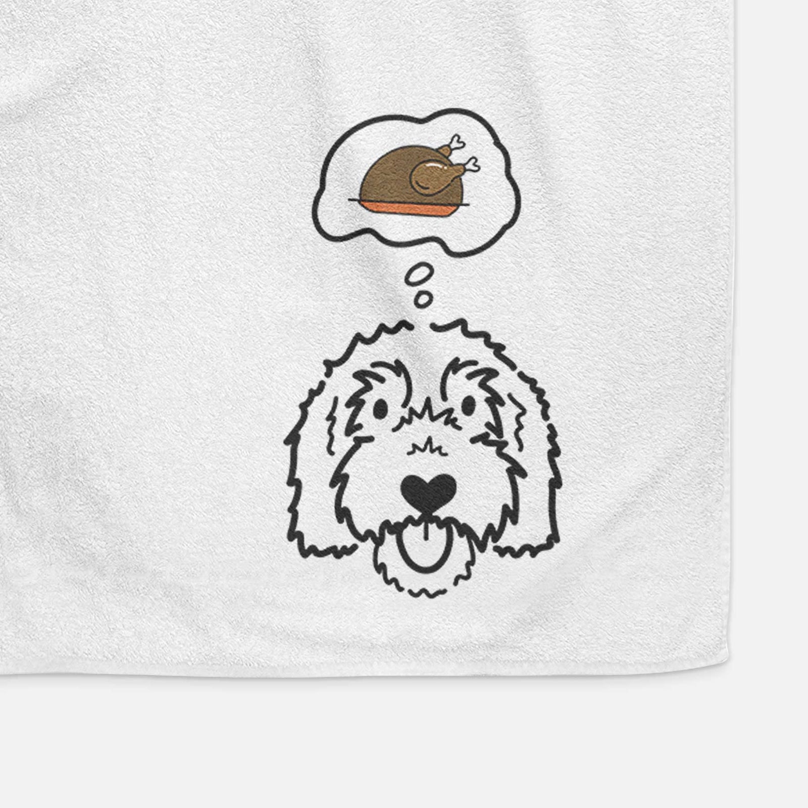 Minimalist line drawing of Gus the Goldendoodle with a little turkey on a decorative hand towel