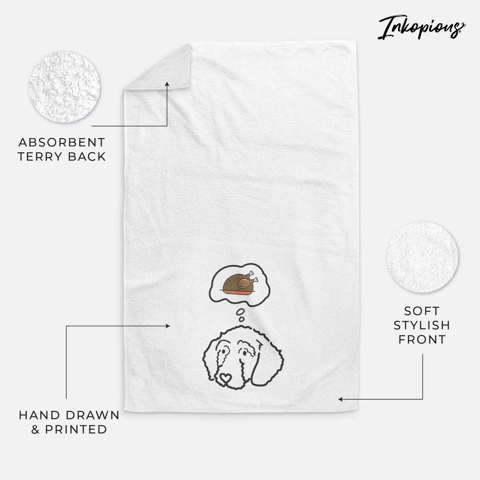 Minimalist line drawing of Hanna the Goldendoodle with a little turkey on a decorative hand towel