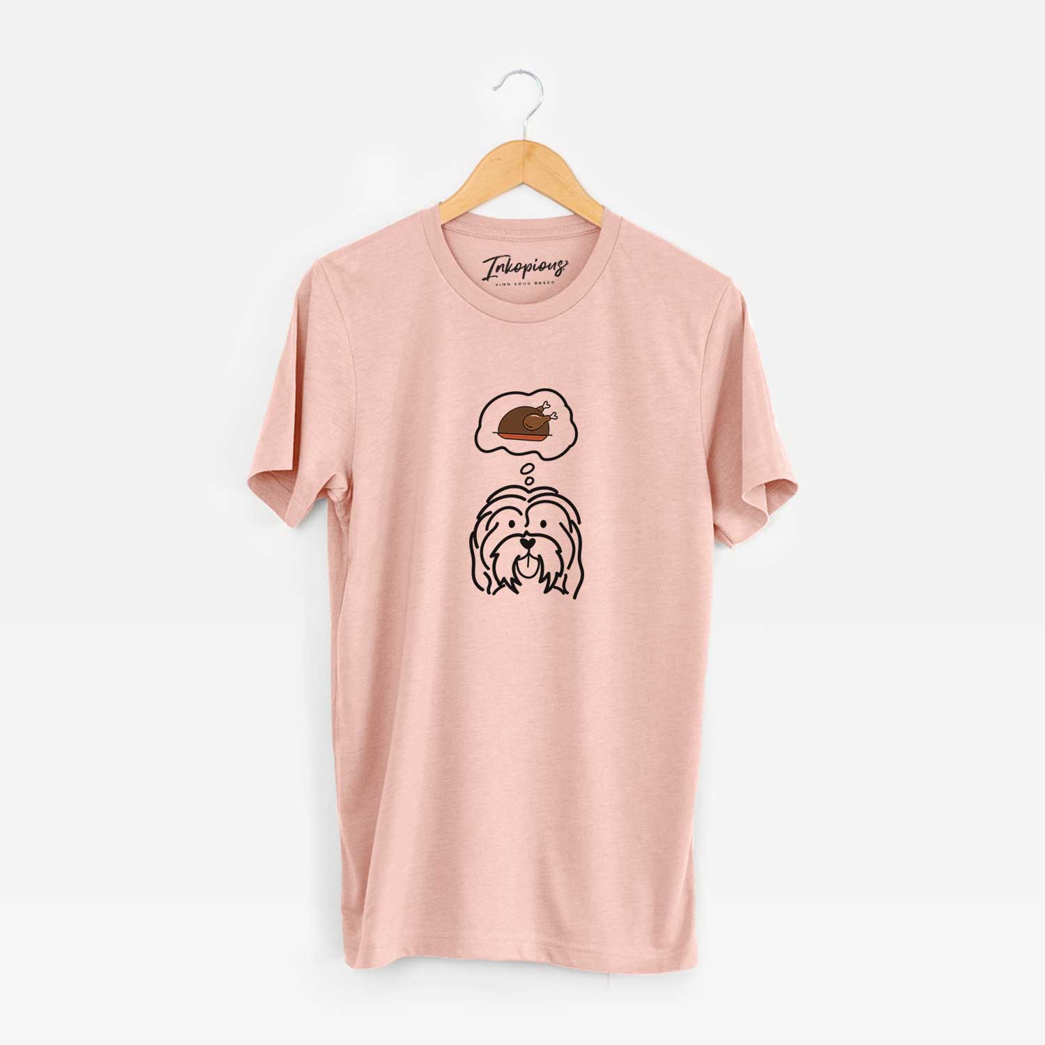 Minimalist line drawing of a Havanese with a little turkey on a Peach Unisex crewneck
