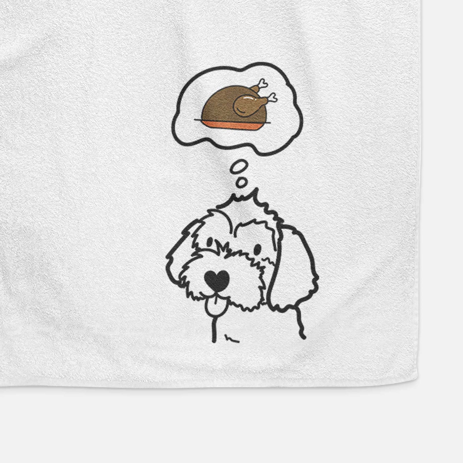 Minimalist line drawing of a Havapoo with a little turkey on a decorative hand towel
