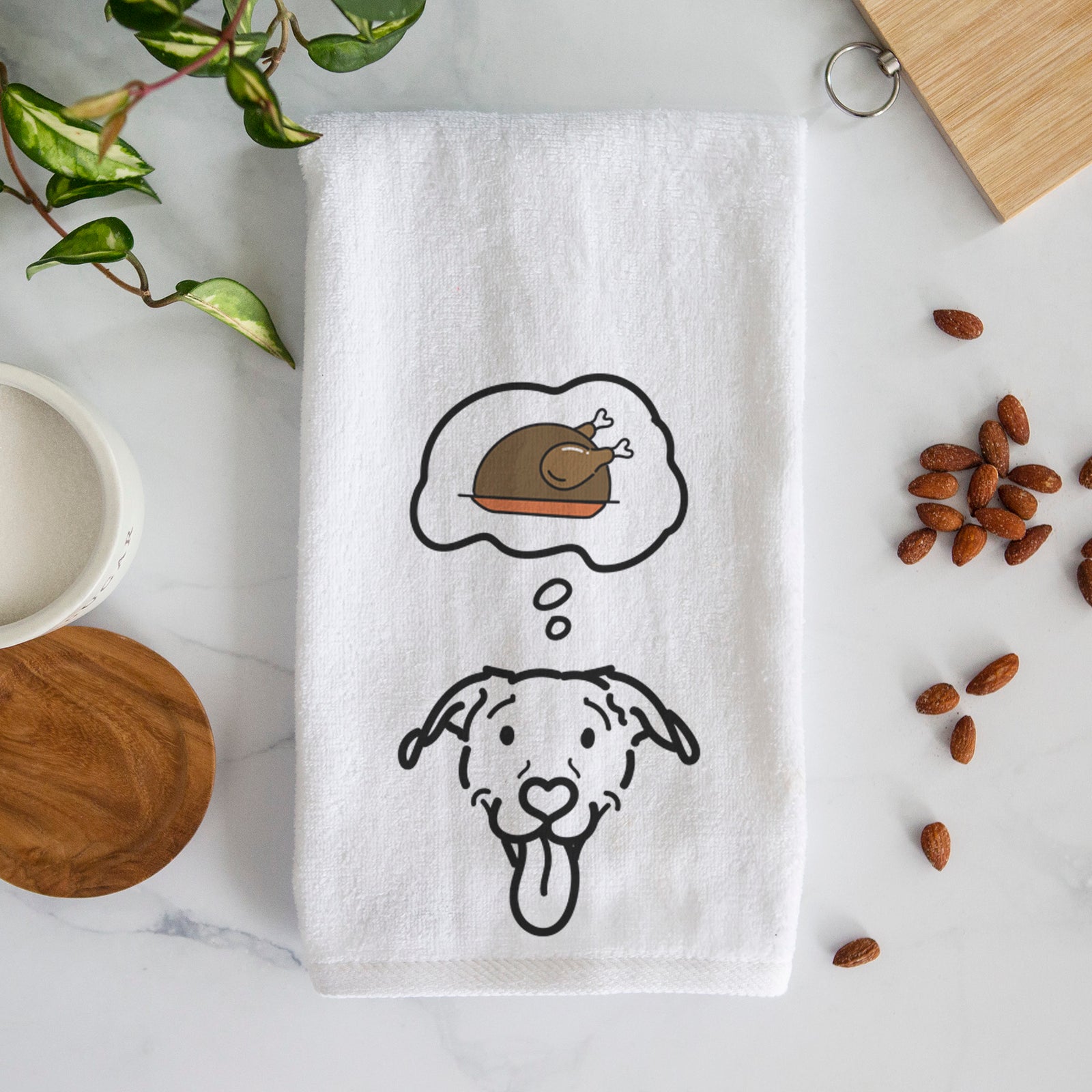 Minimalist line drawing of Hemi the Pitbull Mix with a little turkey on a decorative hand towel