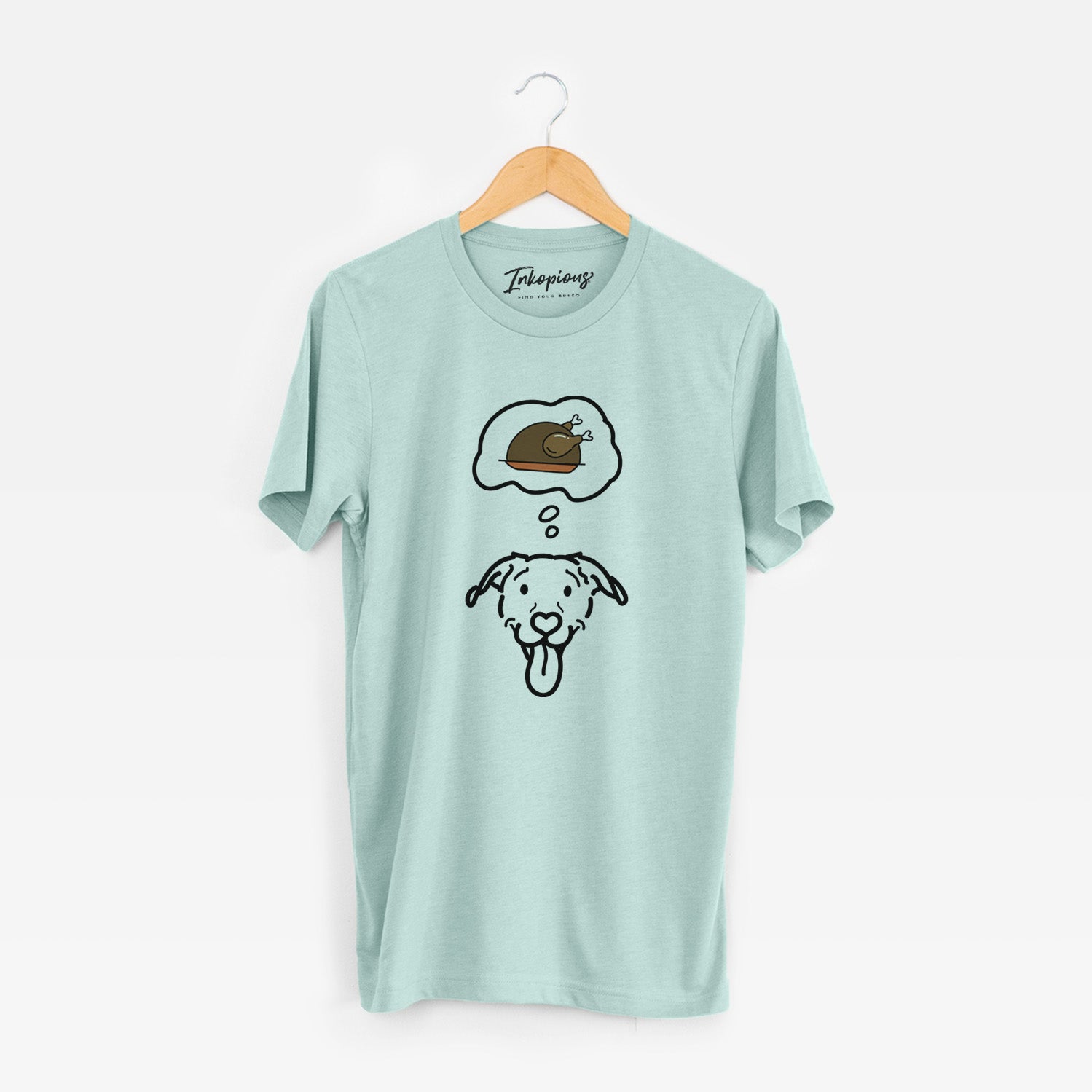 Minimalist line drawing of Hemi the Pitbull Mix with a little turkey on a Heather Sage Unisex crewneck