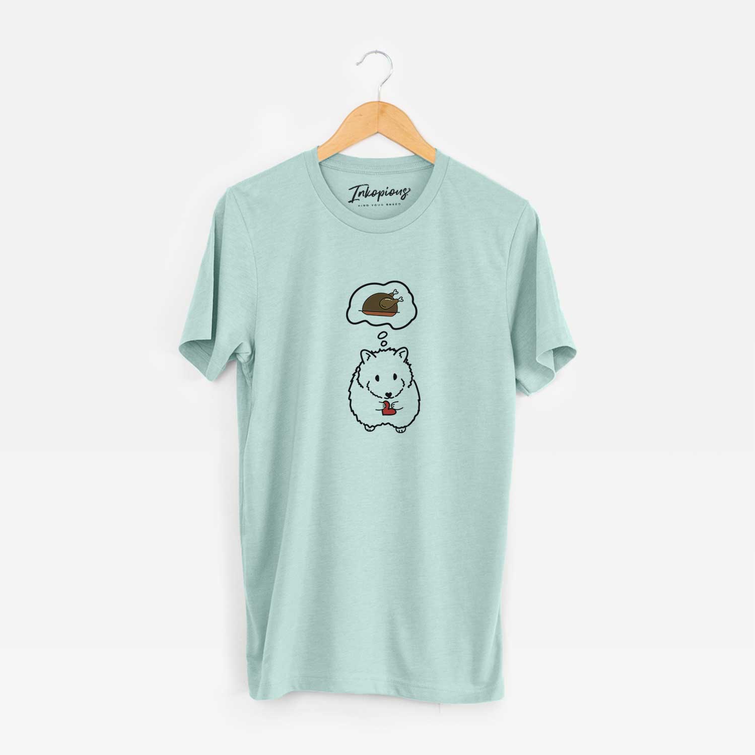 Minimalist line drawing of Hilga the Hamster with a little turkey on a Heather Sage Unisex crewneck
