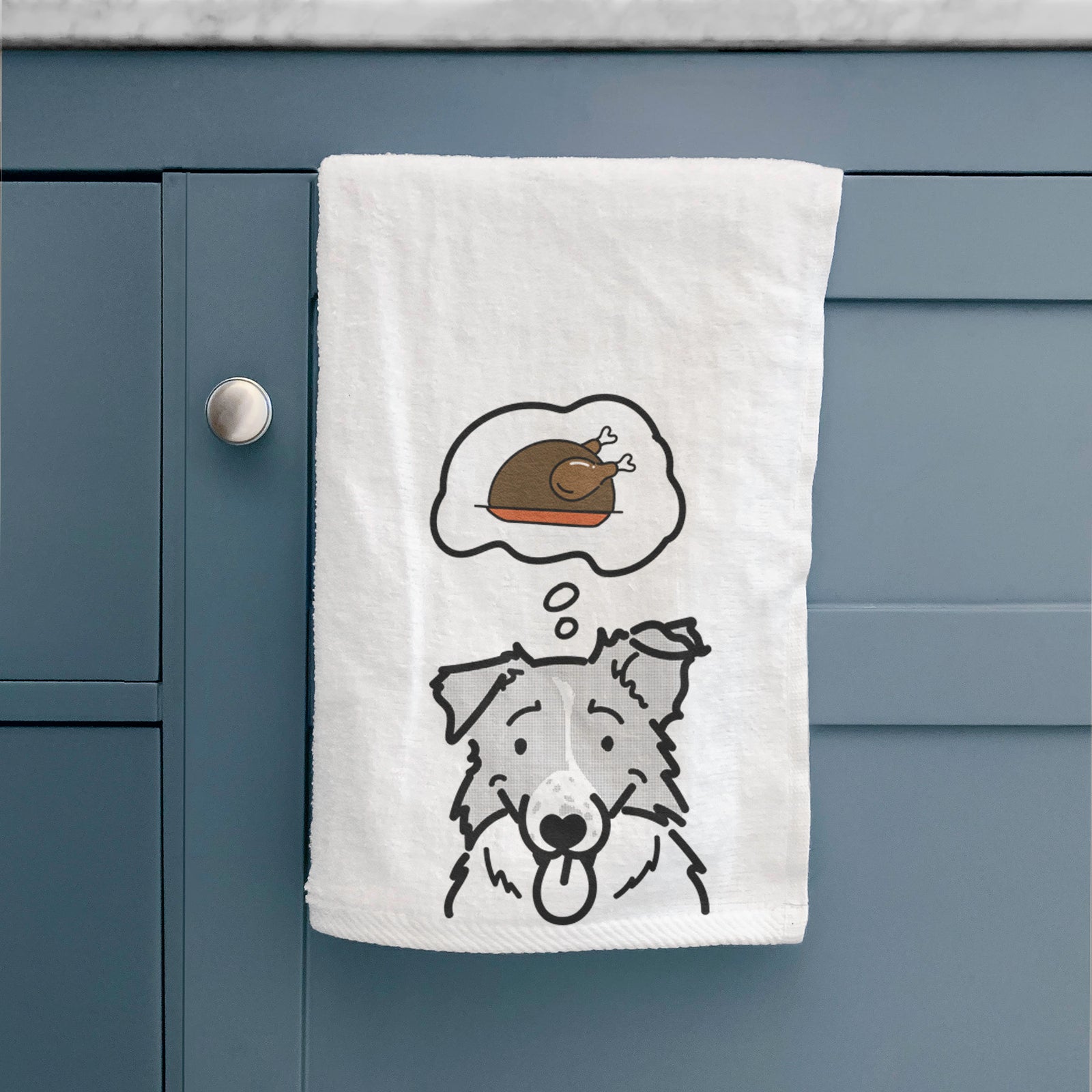 Minimalist line drawing of Jam the Border Collie with a little turkey on a decorative hand towel