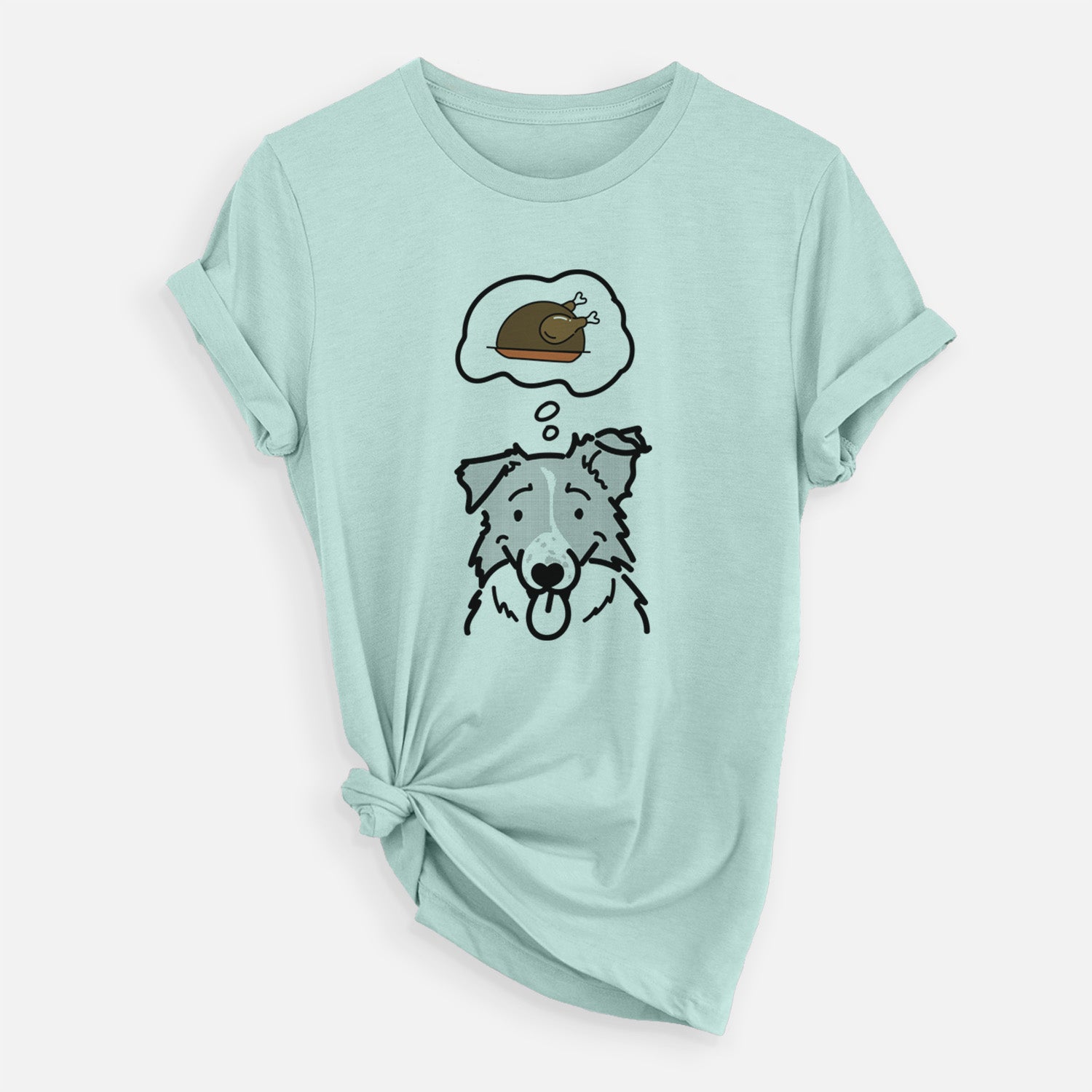 Minimalist line drawing of Jam the Border Collie with a little turkey on a Heather Sage Unisex crewneck