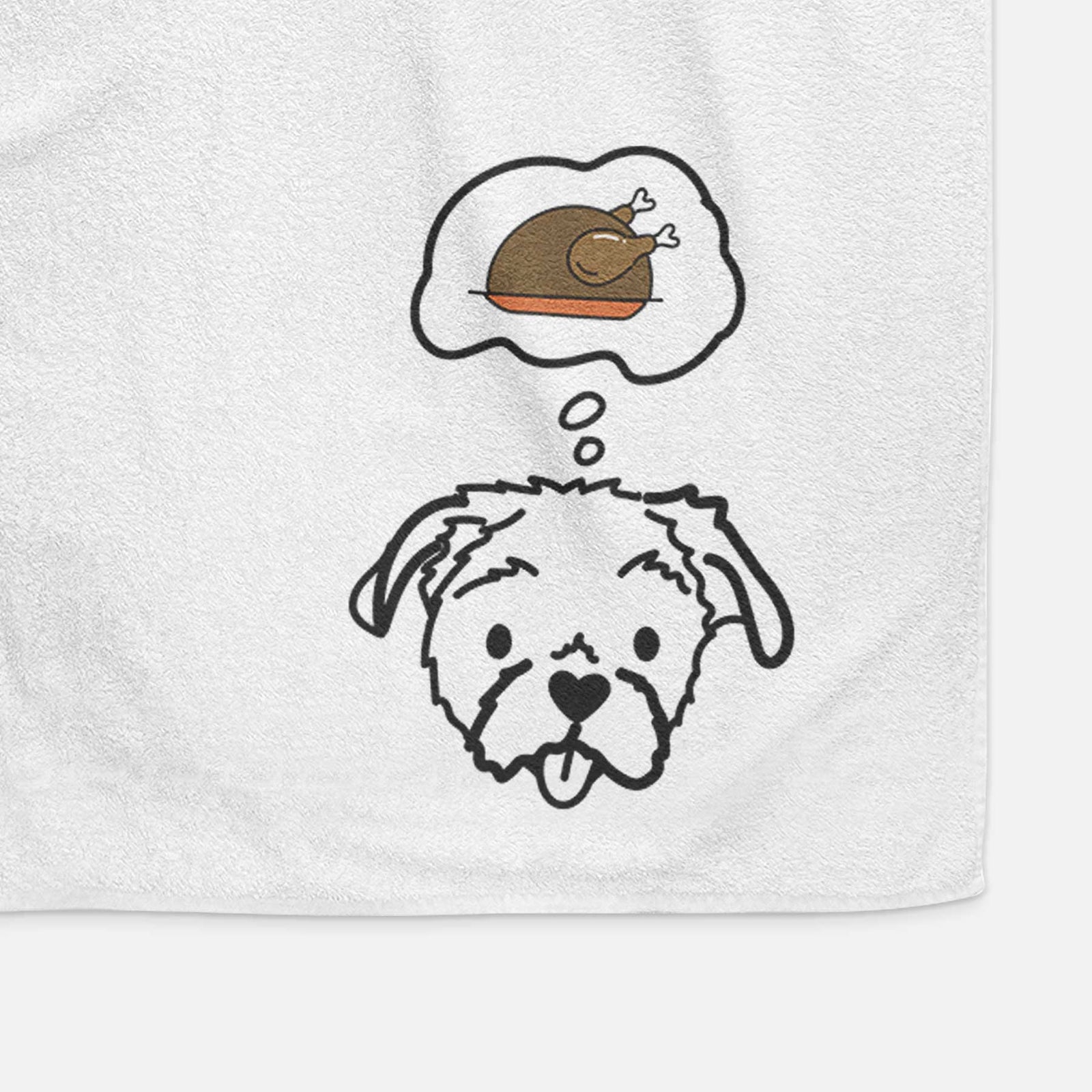 Minimalist line drawing of Koko the Shih Tzu with a little turkey on a decorative hand towel