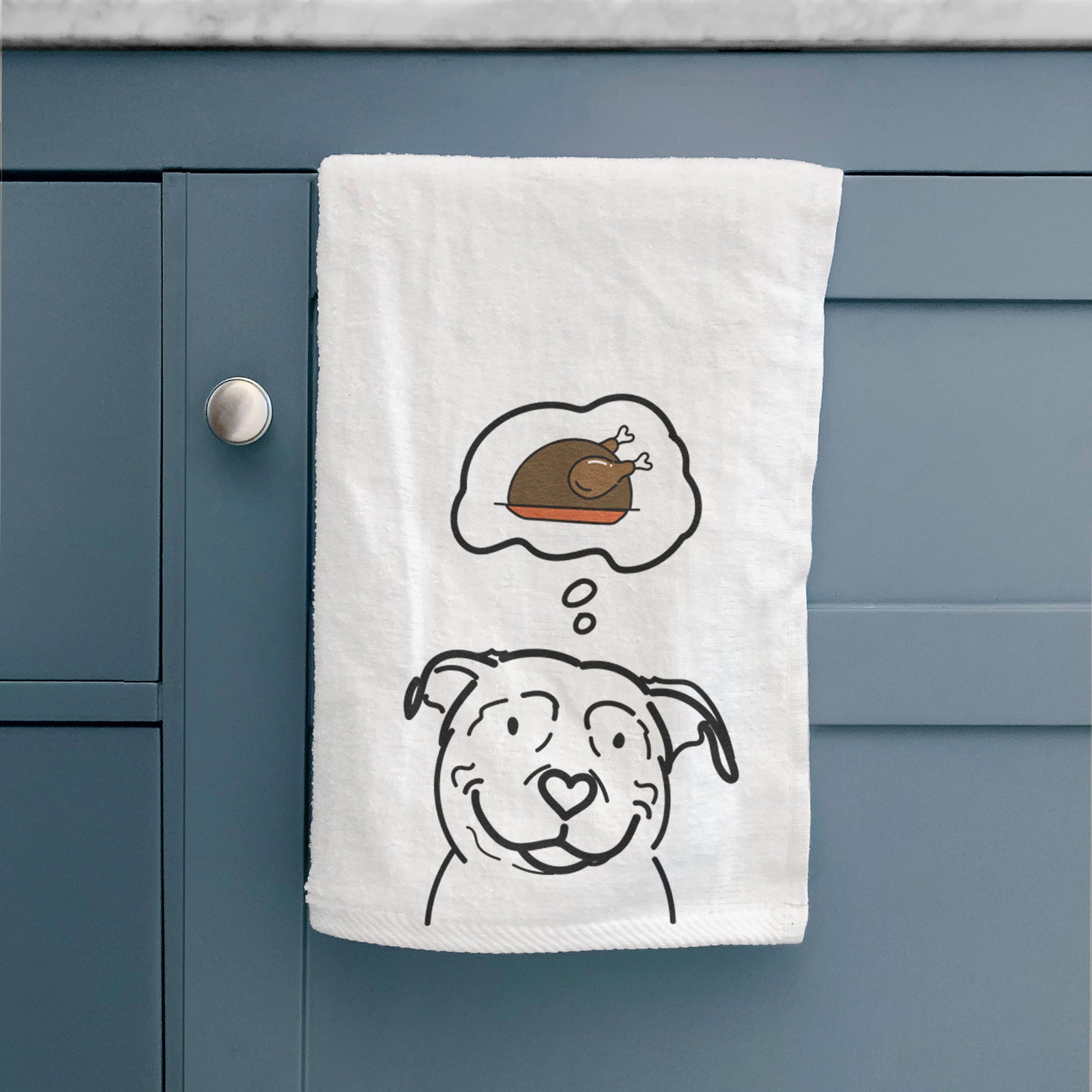 Minimalist line drawing of Lady the American Pitbull Terrier with a little turkey on a decorative hand towel